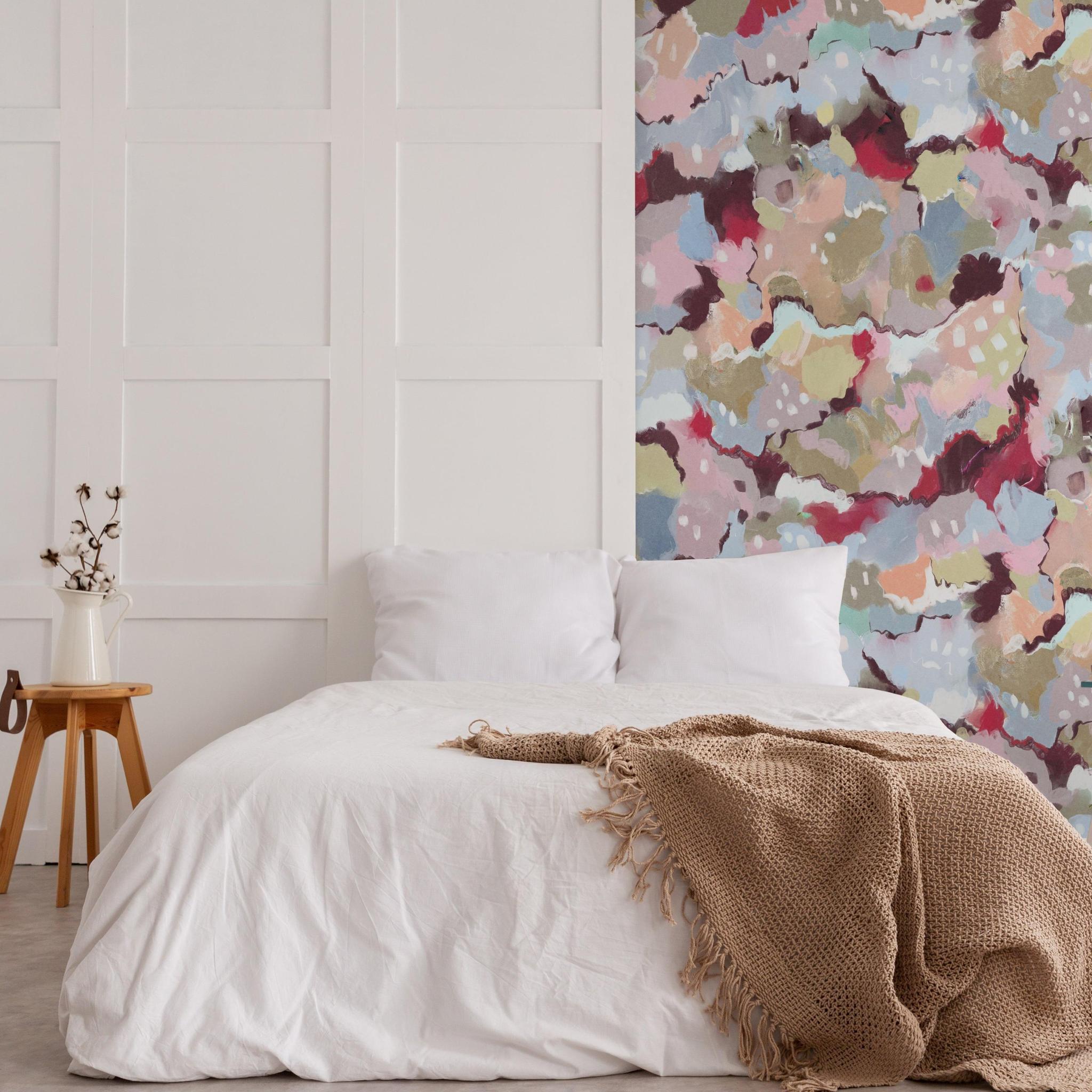 Cozy bedroom featuring abstract Petunia Wallpaper by Wall Blush SG02 as the focal point.