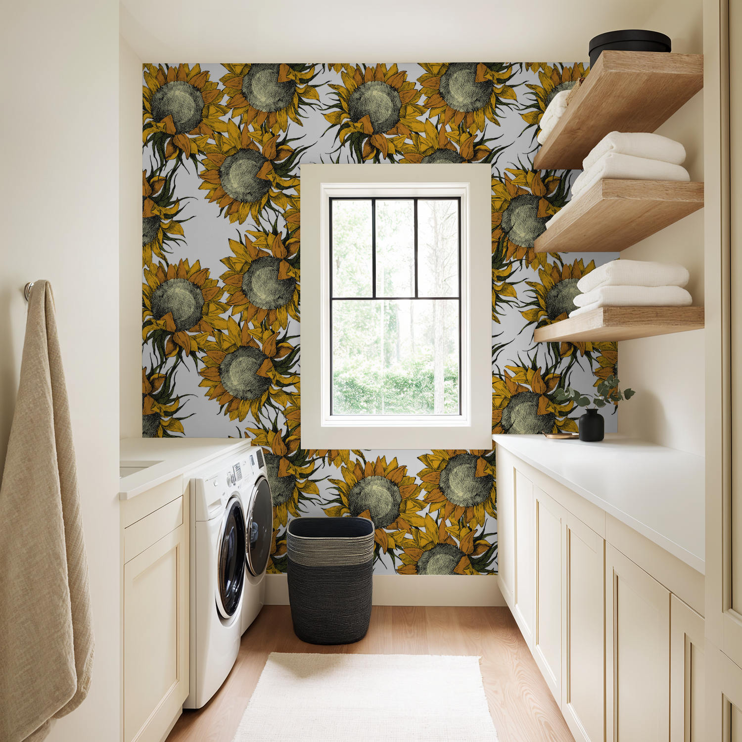 Sunflower wallpaper in laundry room with white cabinets and wooden shelves.