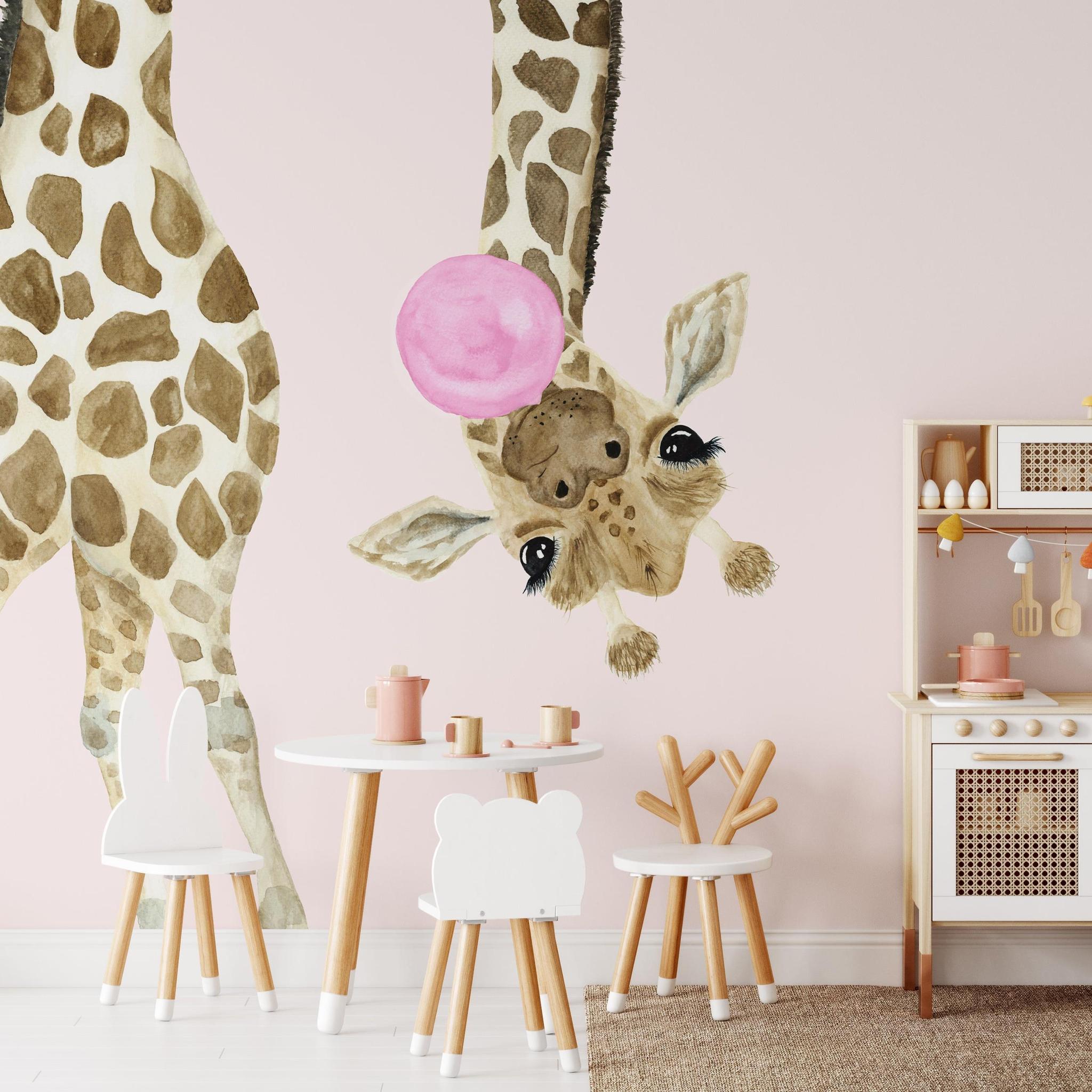 Wall Blush Stevie Kate Wallpaper in a playful children's room with giraffe design, emphasizing decor and aesthetics.