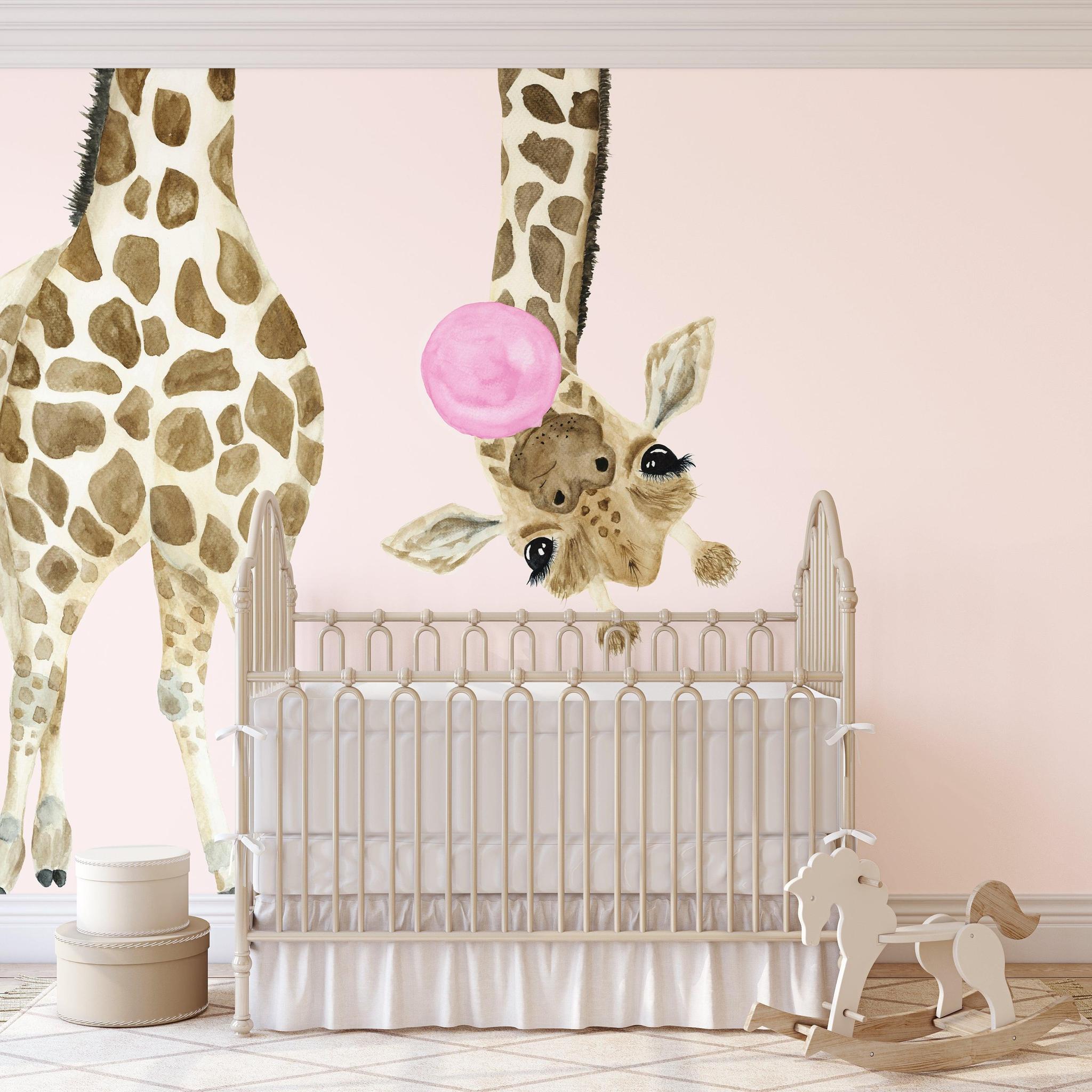 Stevie Kate Wallpaper by Wall Blush in a cozy nursery, featuring giraffe design as the focal point.