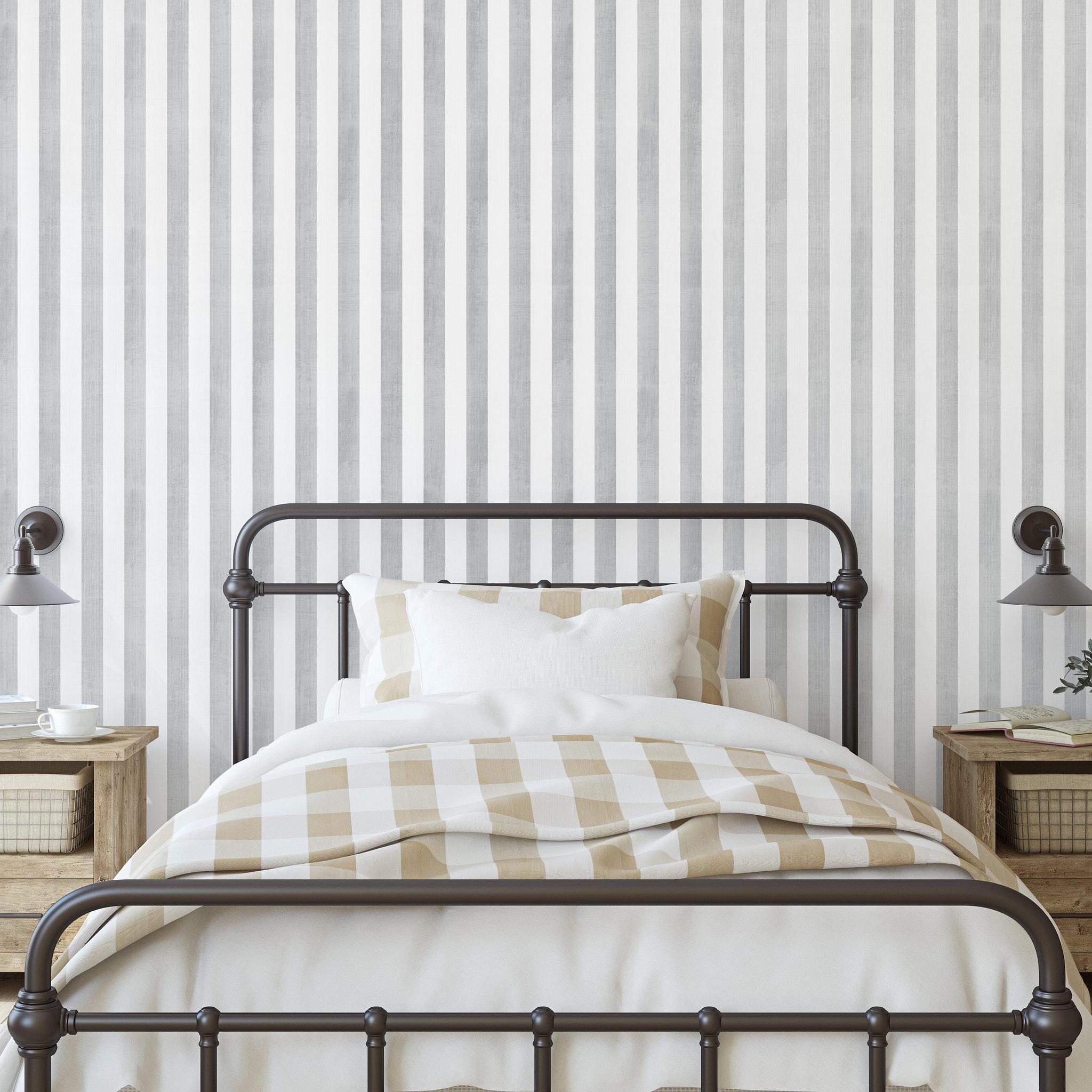 Gabbandra Stripes Wallpaper by The 7th Haven in a cozy bedroom, highlighting the elegant wall design.