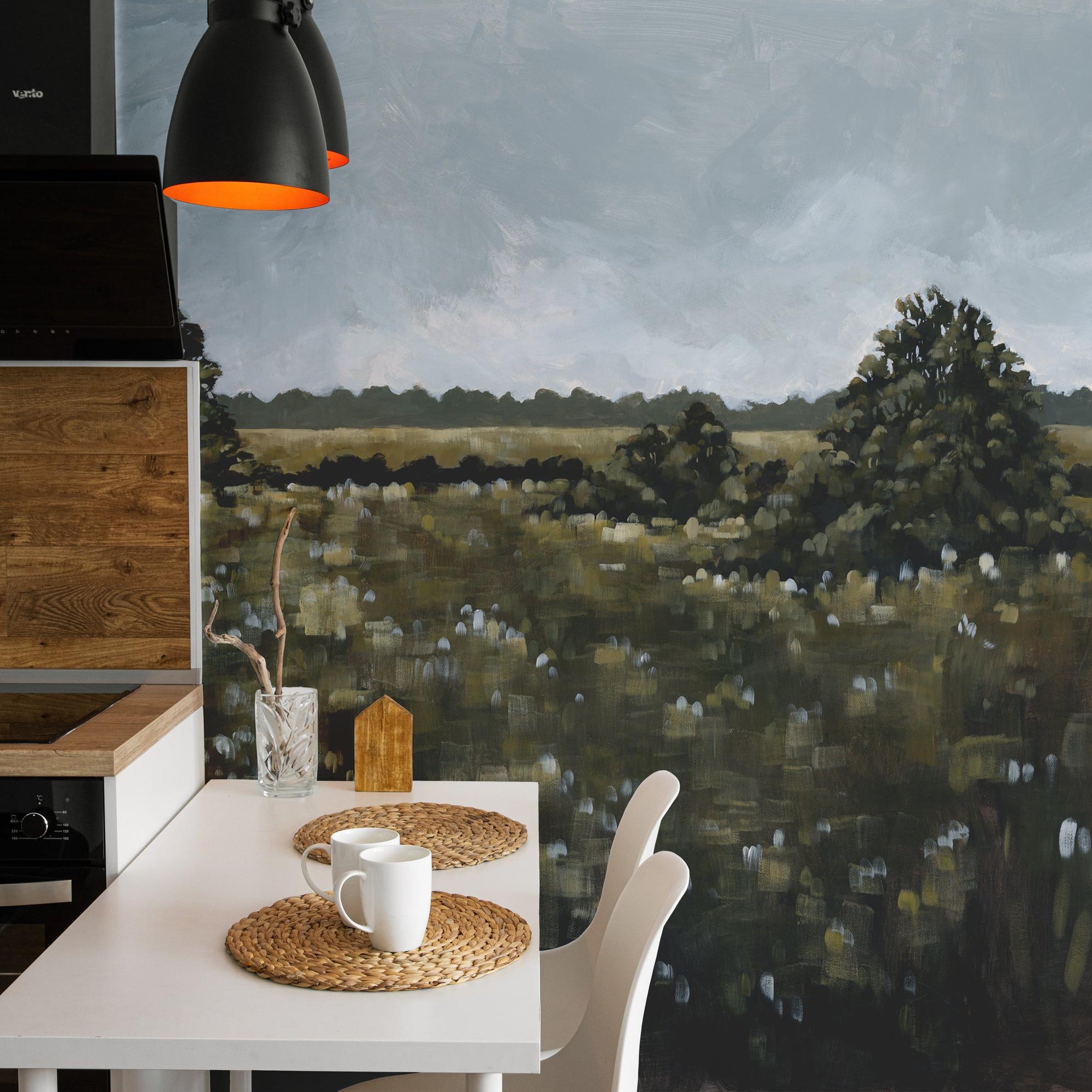 Modern kitchen with Field of Dreams Wallpaper by The David Brazier Line, featuring artistic landscape design.