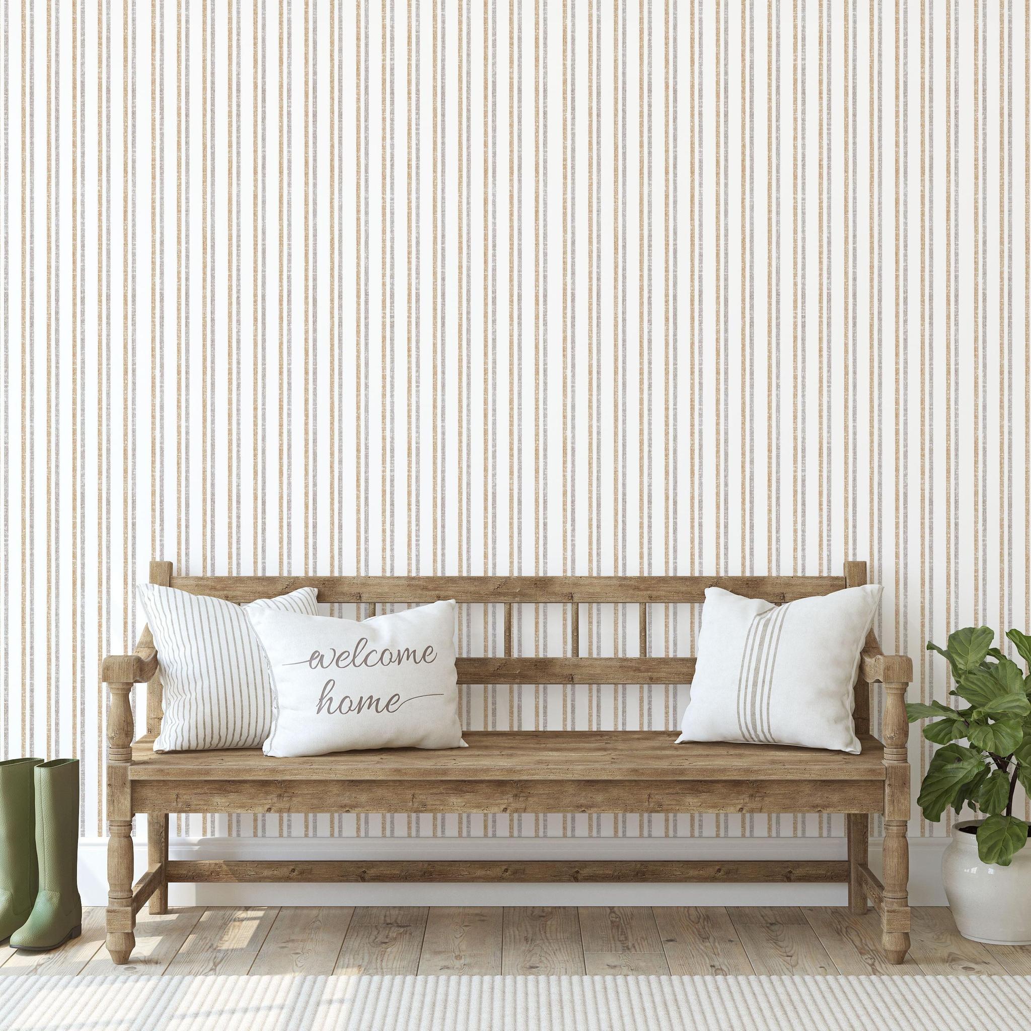 Monroe wallpaper by Wall Blush AW01 in a cozy entryway with bench and green boots.