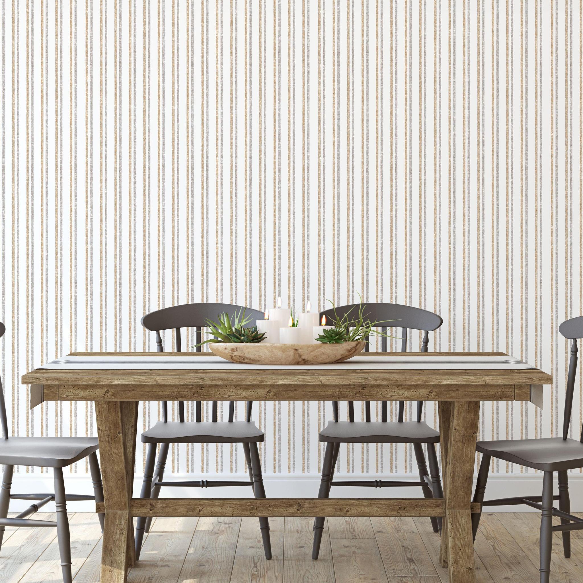 Monroe pattern Wall Blush AW01 wallpaper in a stylish dining room with wooden table and chairs.