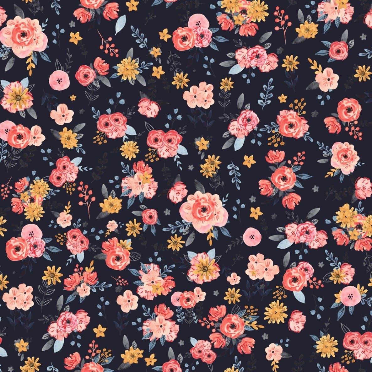 Alt text: Wall Blush 'In Bloom (Navy) Wallpaper' with elegant floral pattern showcased in a modern living room setting, highlighting the wall decor.