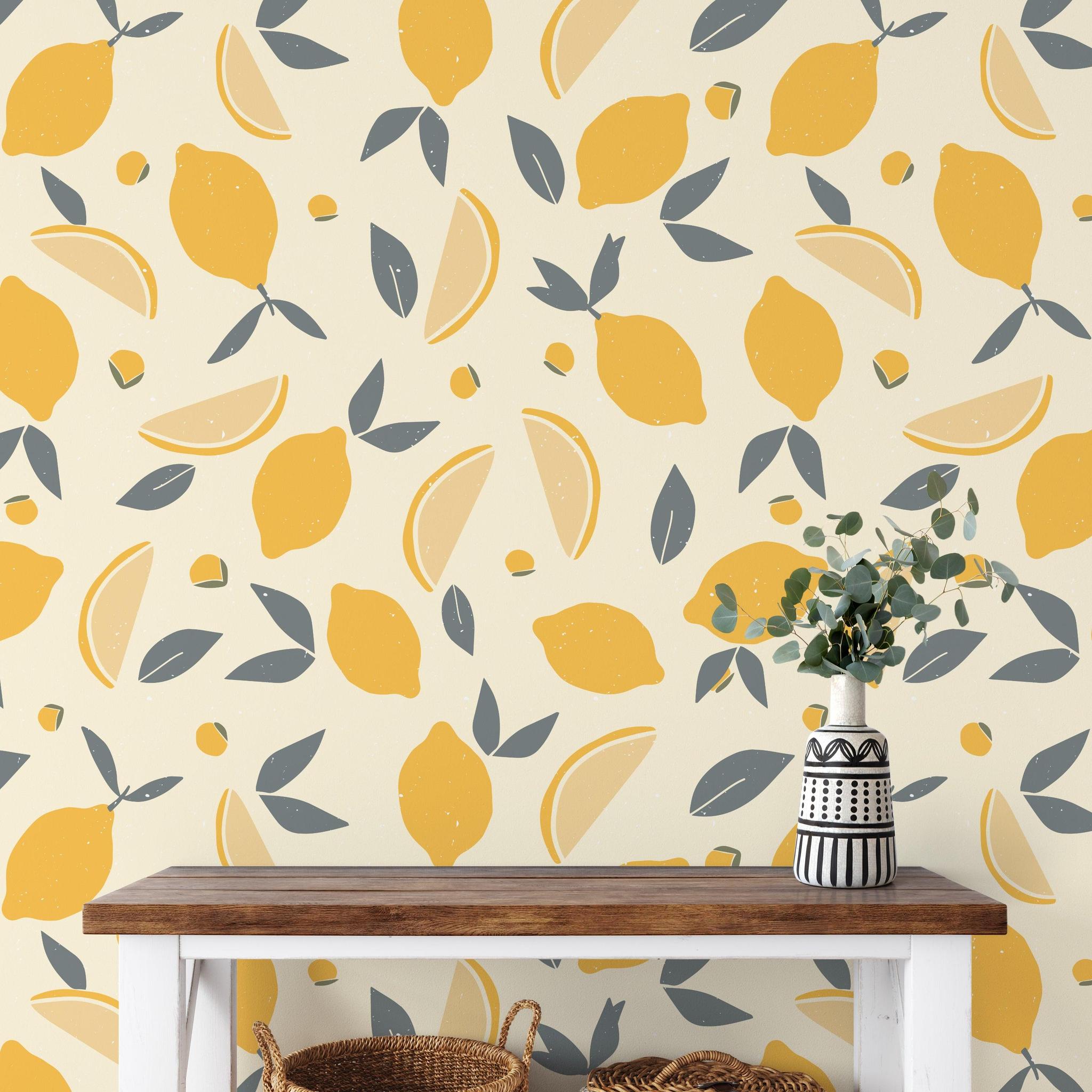Lemmy Wallpaper from Wall Blush in a stylish room, vibrant citrus patterned focus, with decorative accessories.