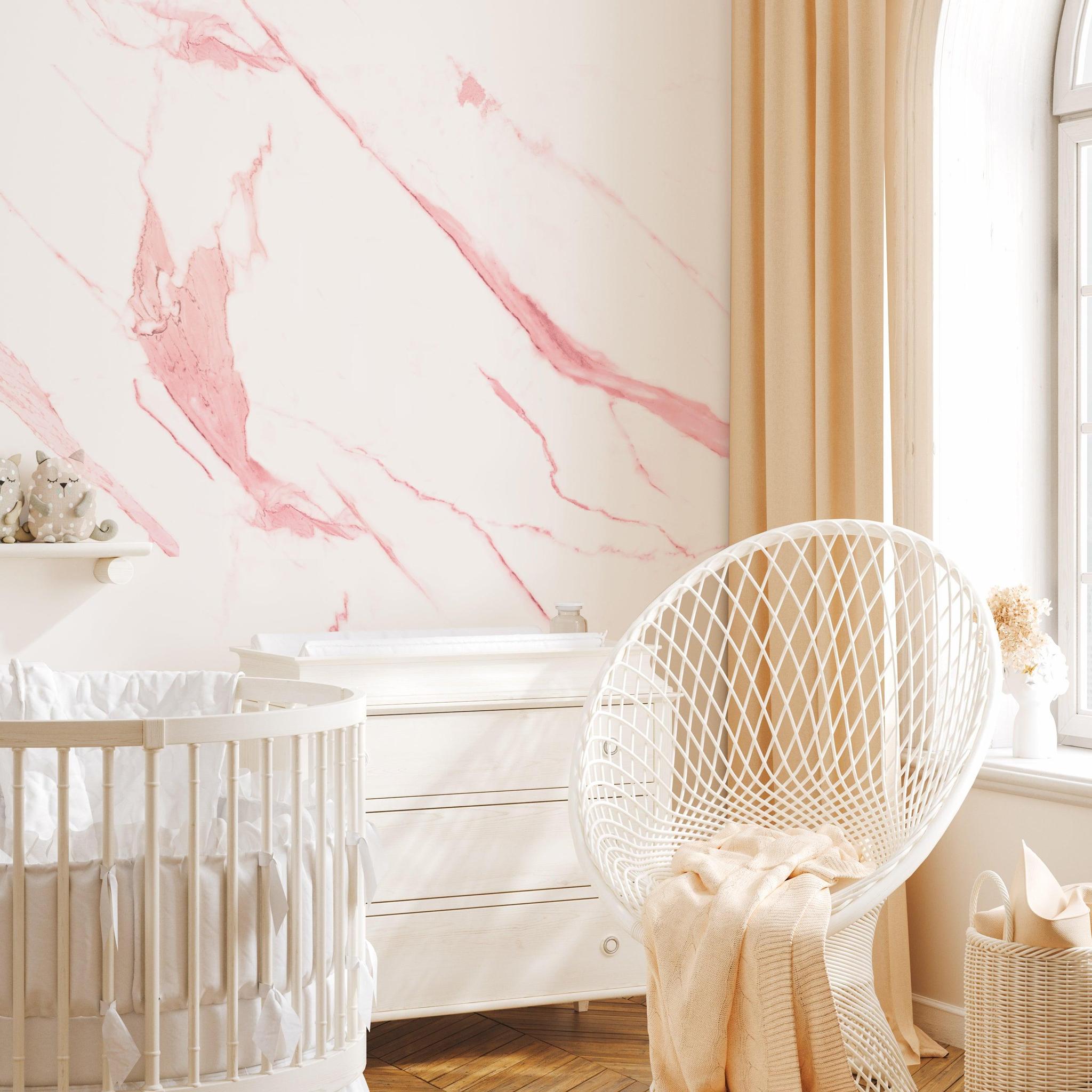 Ethereal Wallpaper by The Clements Crew Line in a serene nursery, highlighting elegant pink marble design focus.