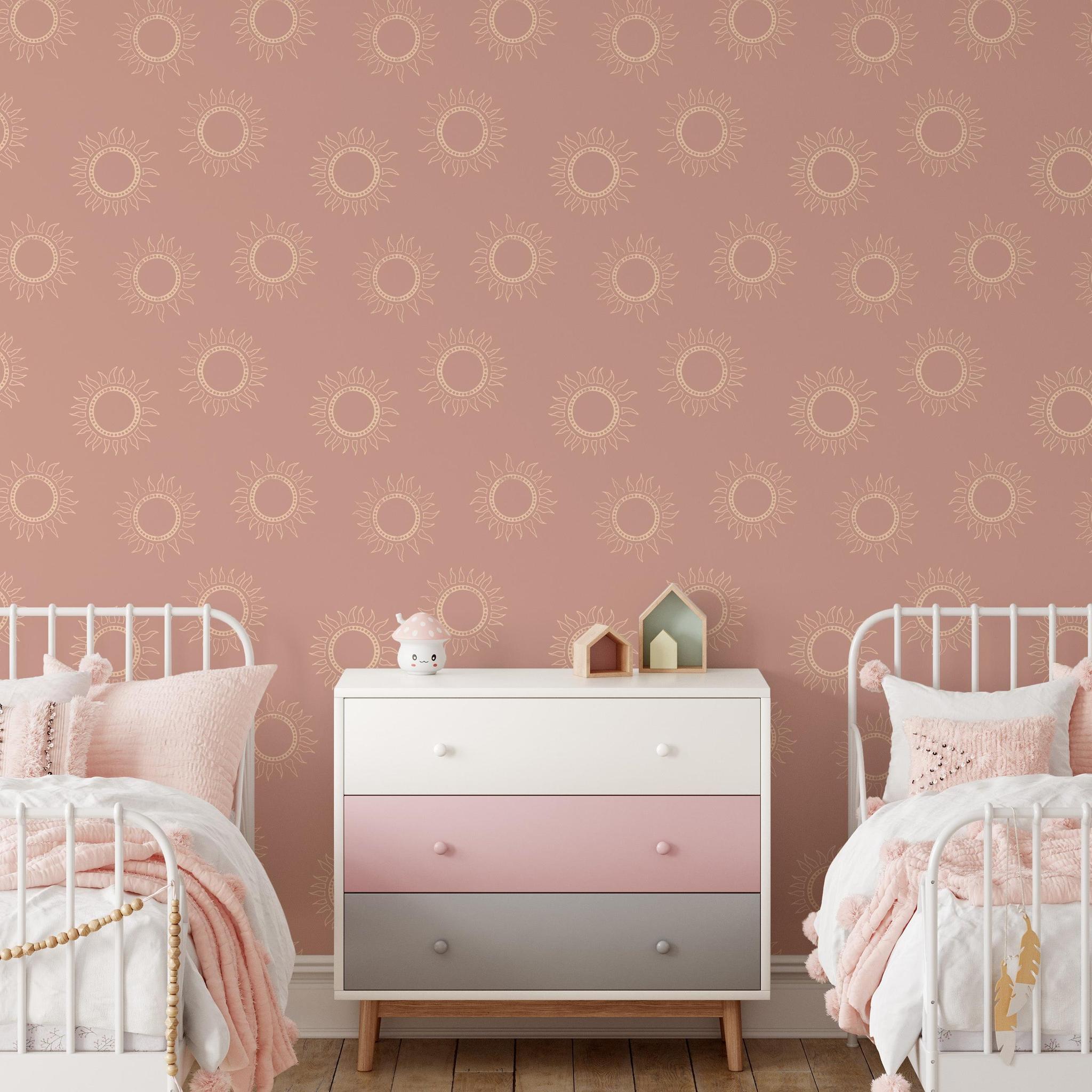 Wall Blush's Sun Kissed Wallpaper in a cozy twin bedroom with stylish pink decor accents