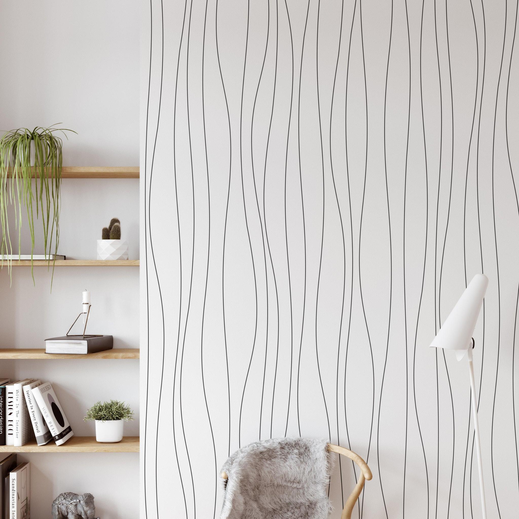 Wall Blush's High Glades Wallpaper in a modern living room setting, showcasing its elegant vertical patterns.