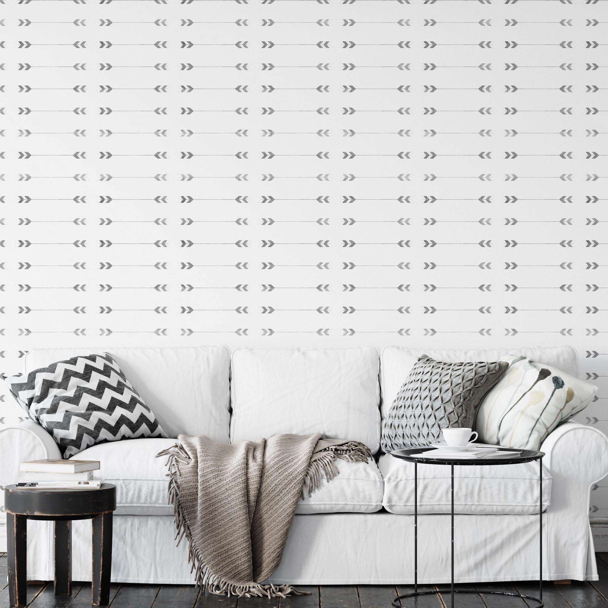 Archer Wallpaper from The Chelsea DeBoer Line in a stylish living room setting, highlighting the pattern and design.