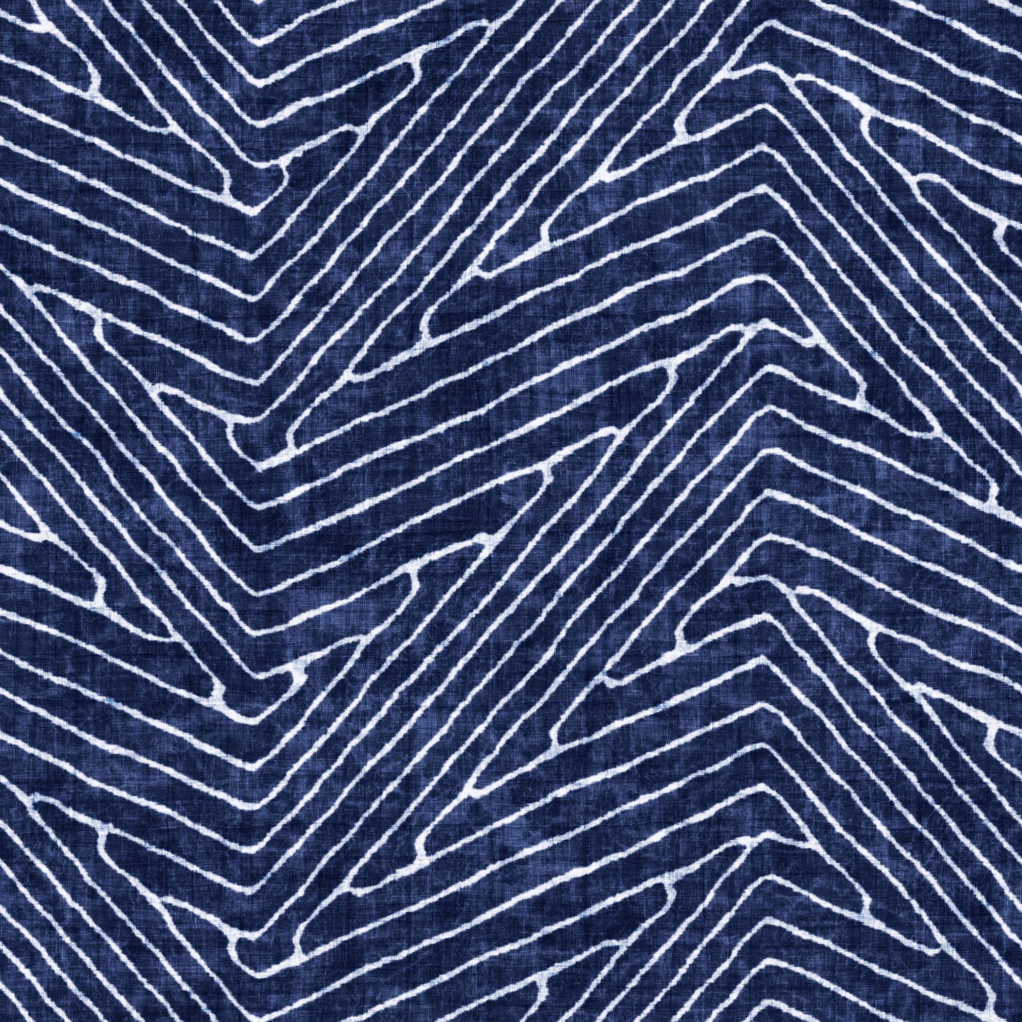 "Windsor Wallpaper by Wall Blush with blue patterns in a minimalist styled living room."