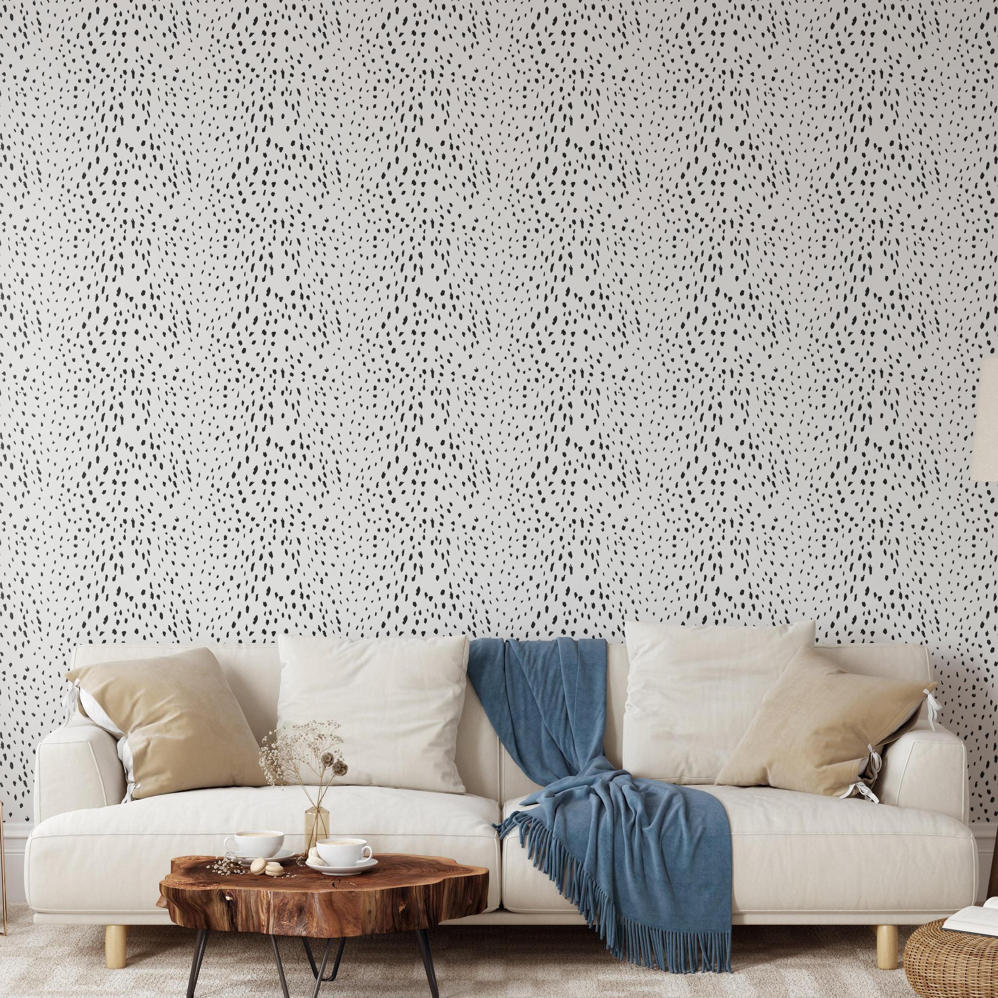 Charlie Black and White Wallpaper from The Chelsea DeBoer Line in cozy living room setting, focus on wall decor.