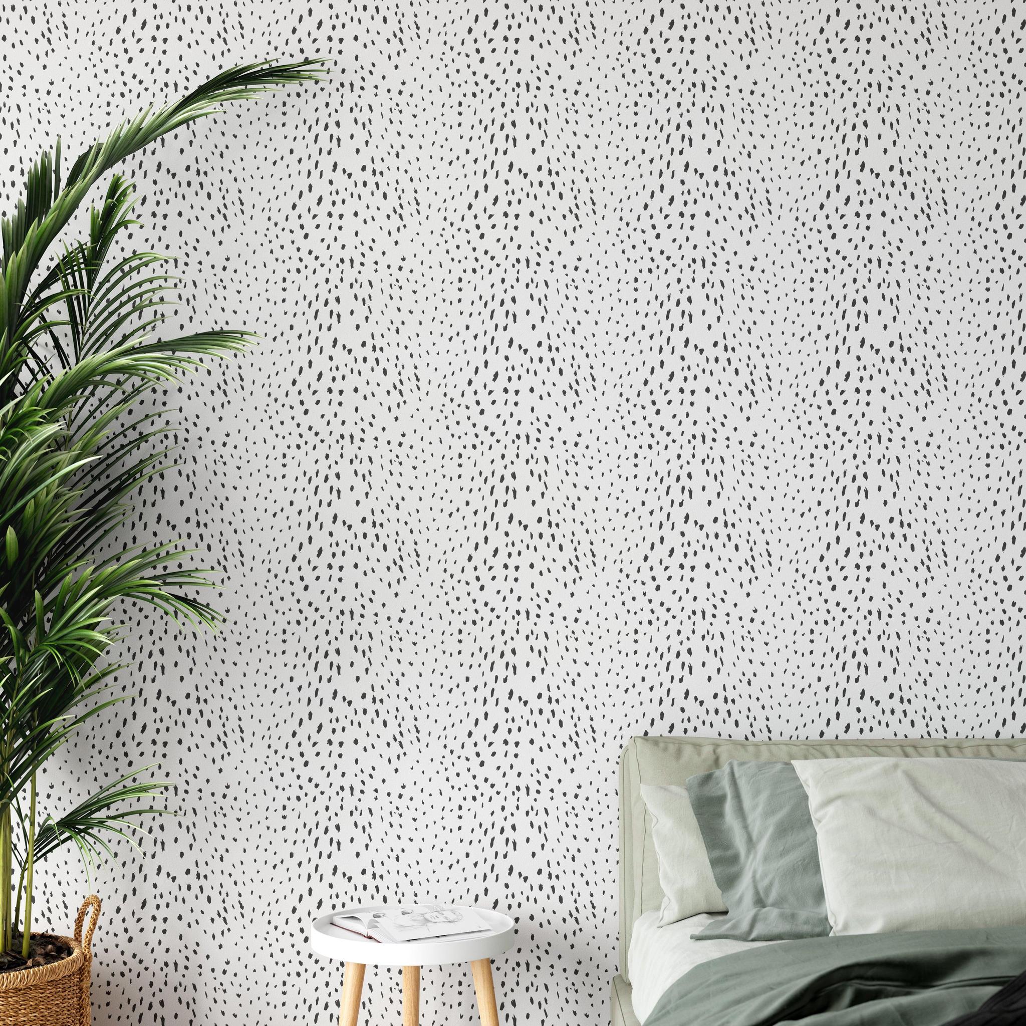 Charlie Black and White Wallpaper from The Chelsea DeBoer Line in a modern bedroom, creating a stylish focal point.