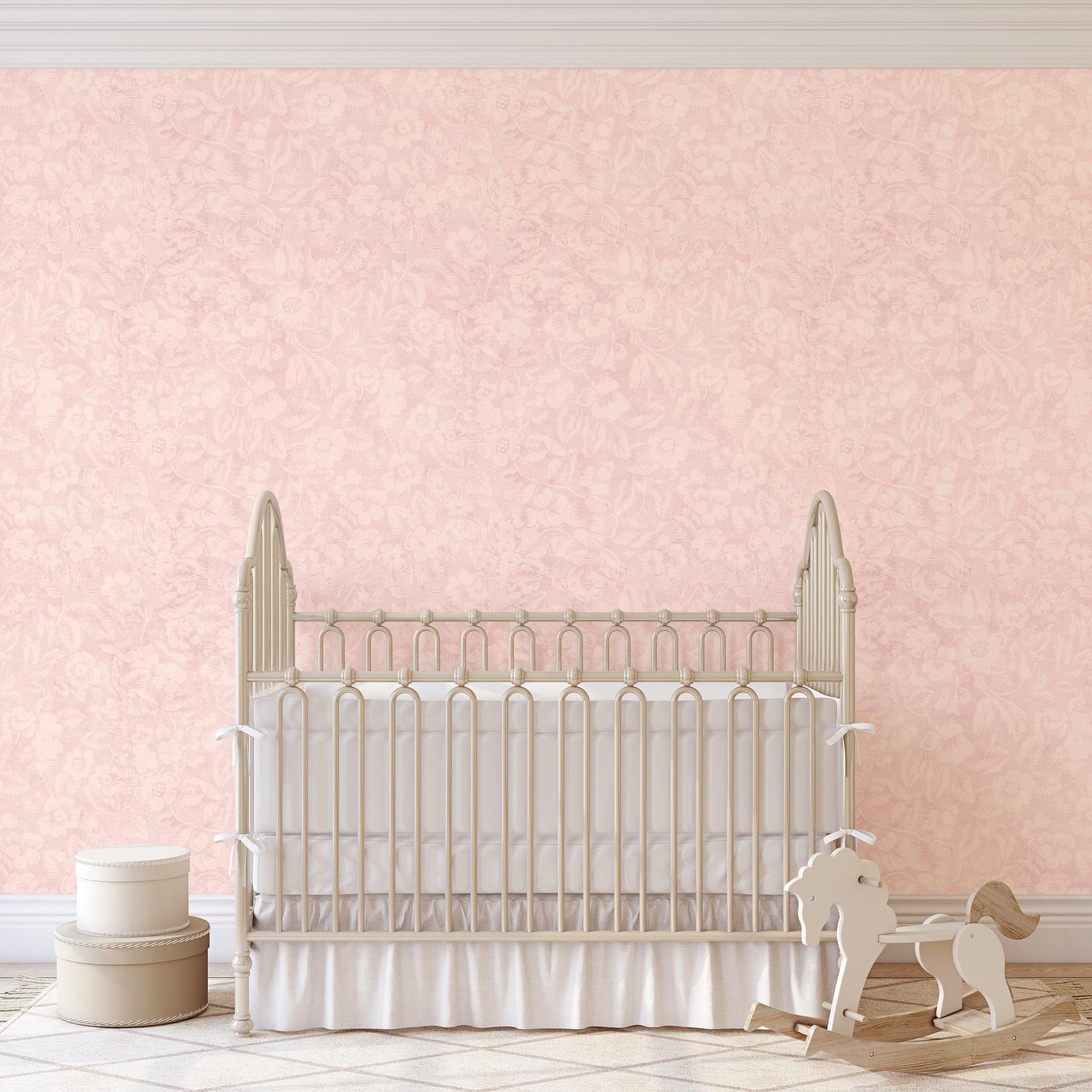 Charlotte's Chantilly Wallpaper in a nursery by The 7th Haven Interiors Line with cream crib and rocking horse.