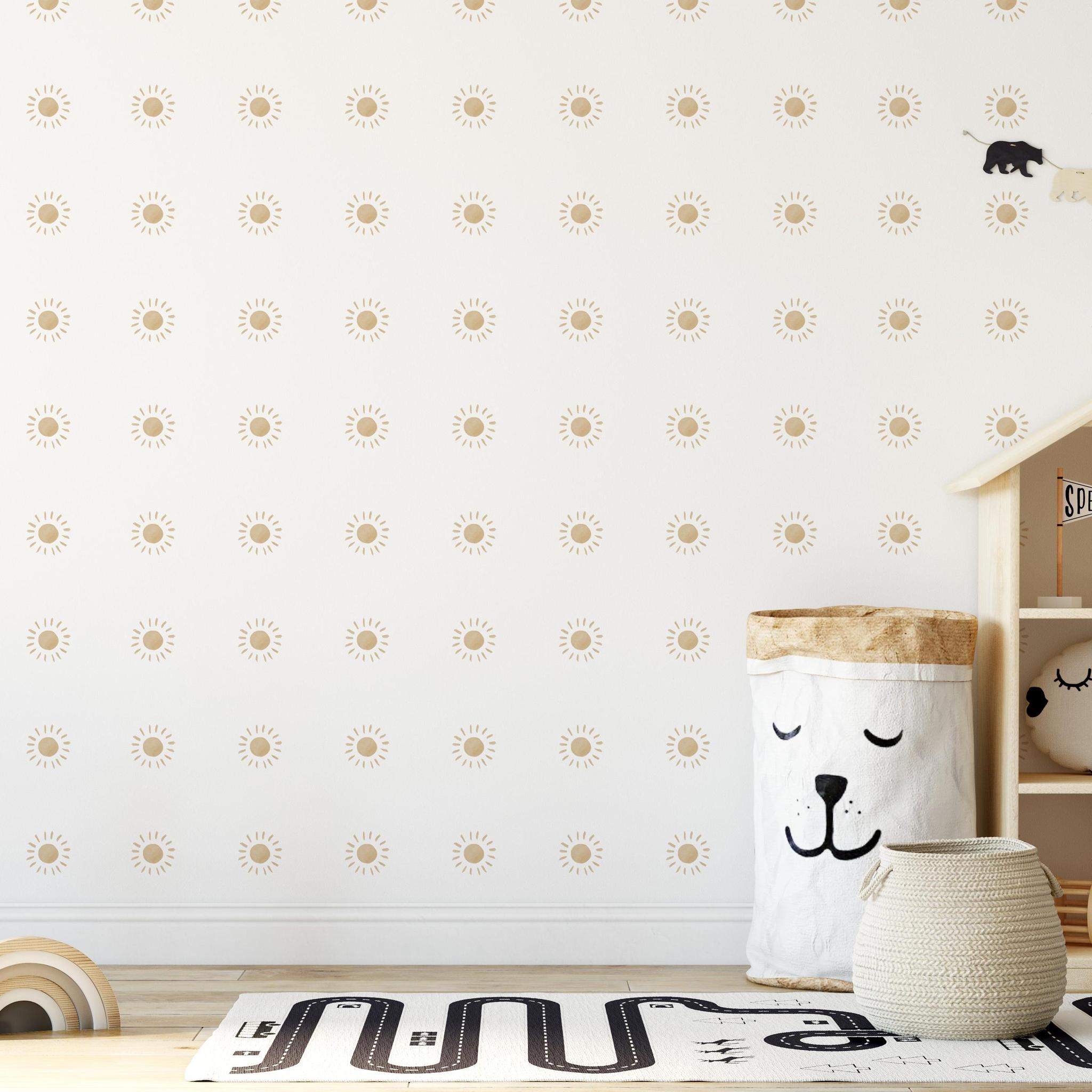 Dawn Wallpaper by Wall Blush SG02, sun-patterned design in a stylish children's room with toys.