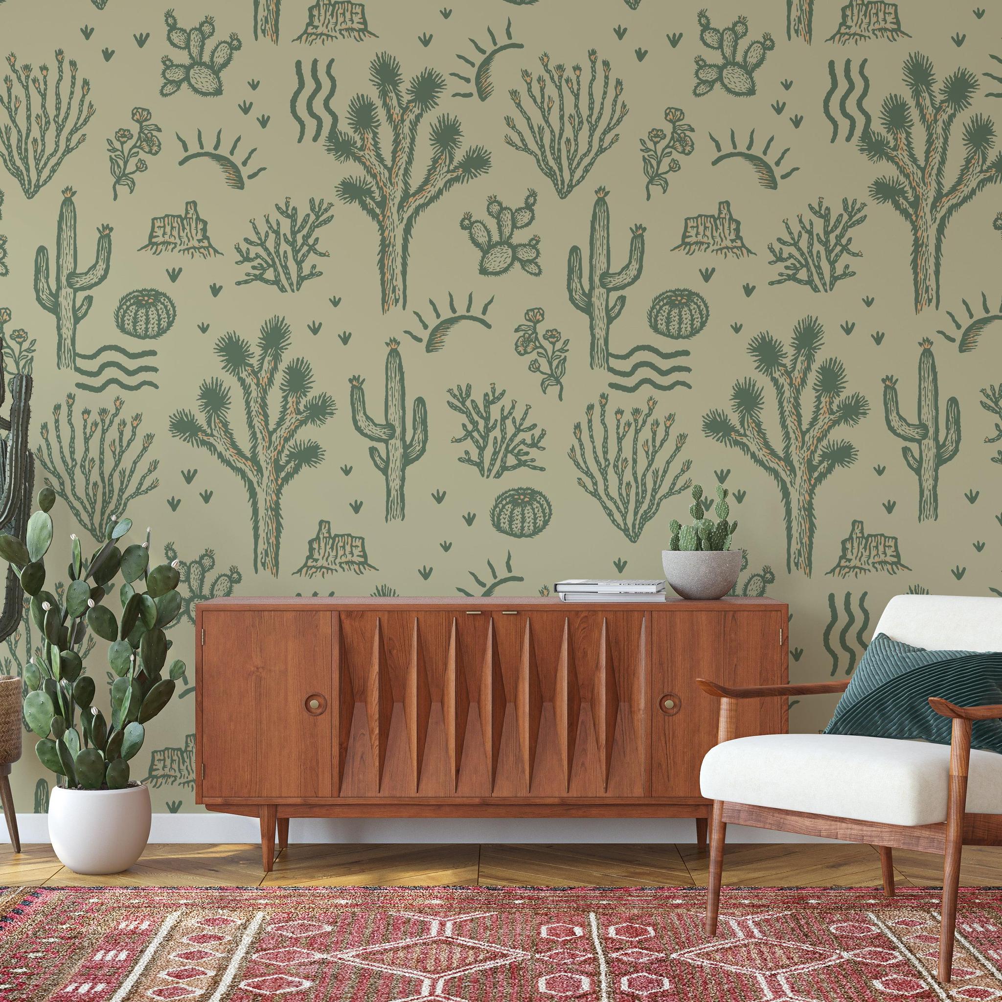 Desert Dreamer (Green) Wallpaper by The Rayco Line in a stylish living room setting focused on wall decor.