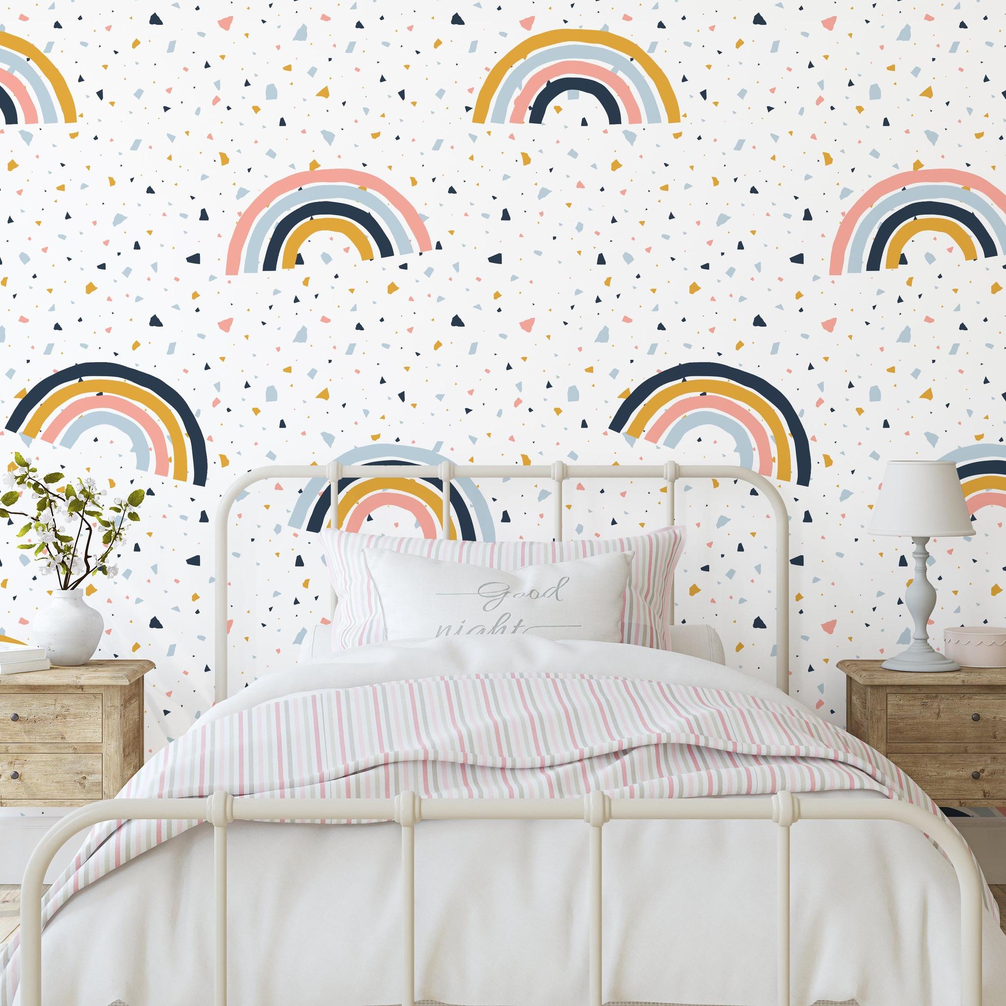 Wall Blush Funfetti Wallpaper enhancing a modern bedroom's aesthetic with playful rainbow patterns.