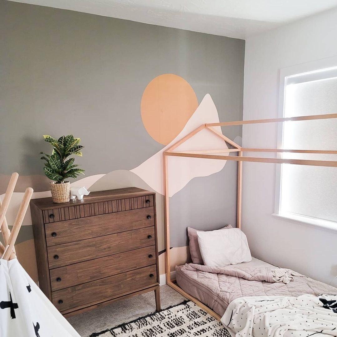 Wall Blush Journey Wallpaper accent in a modern bedroom with stylish decor and furniture.