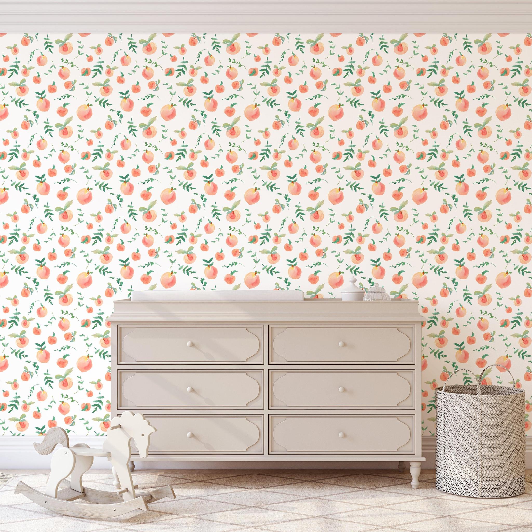 Peachy Clean Wallpaper by Wall Blush in nursery room, with detailed fruit pattern focus.