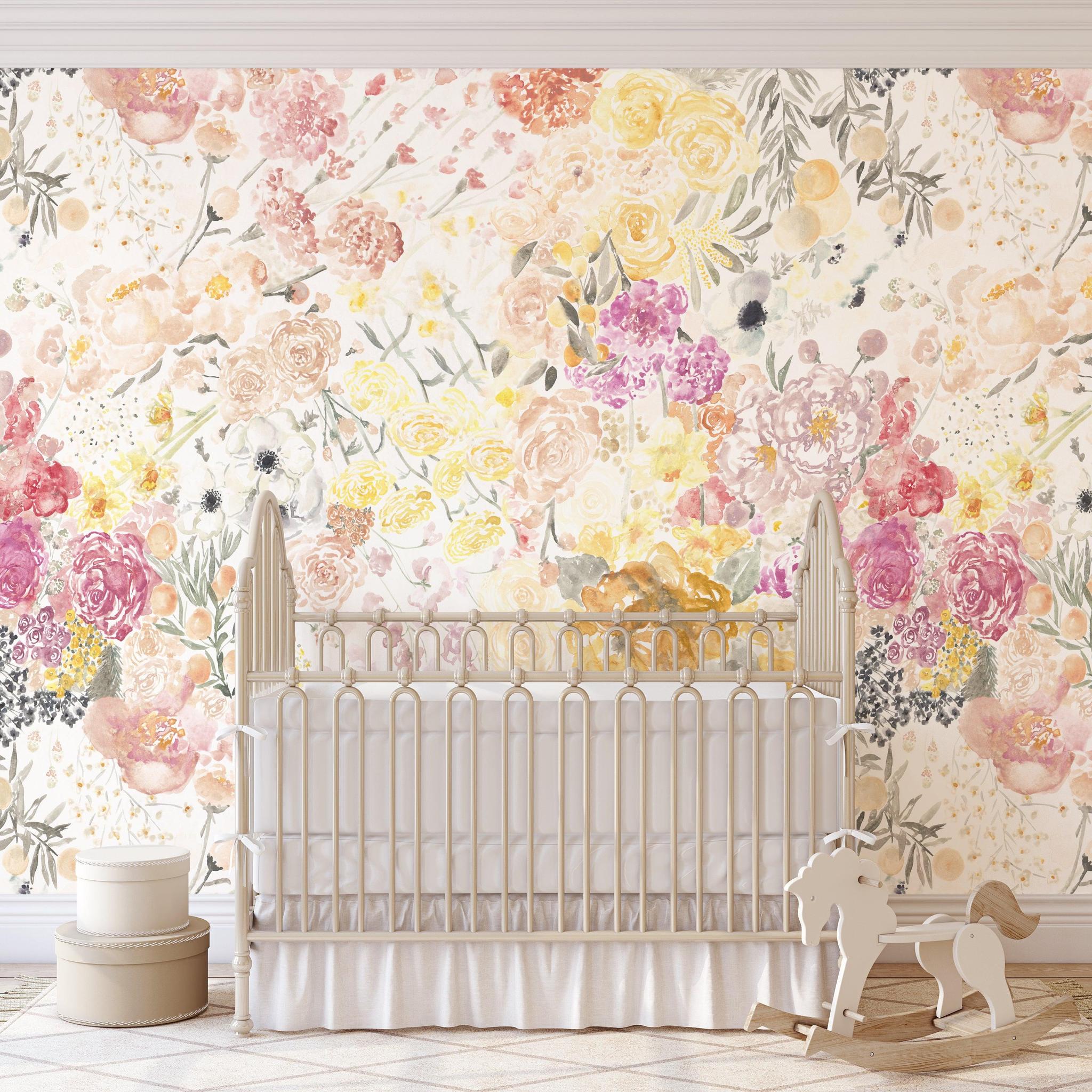 Alt: Elegant Spring Fling Wallpaper from The Salem Gideon Line in a cozy nursery room, showcasing vibrant floral patterns.