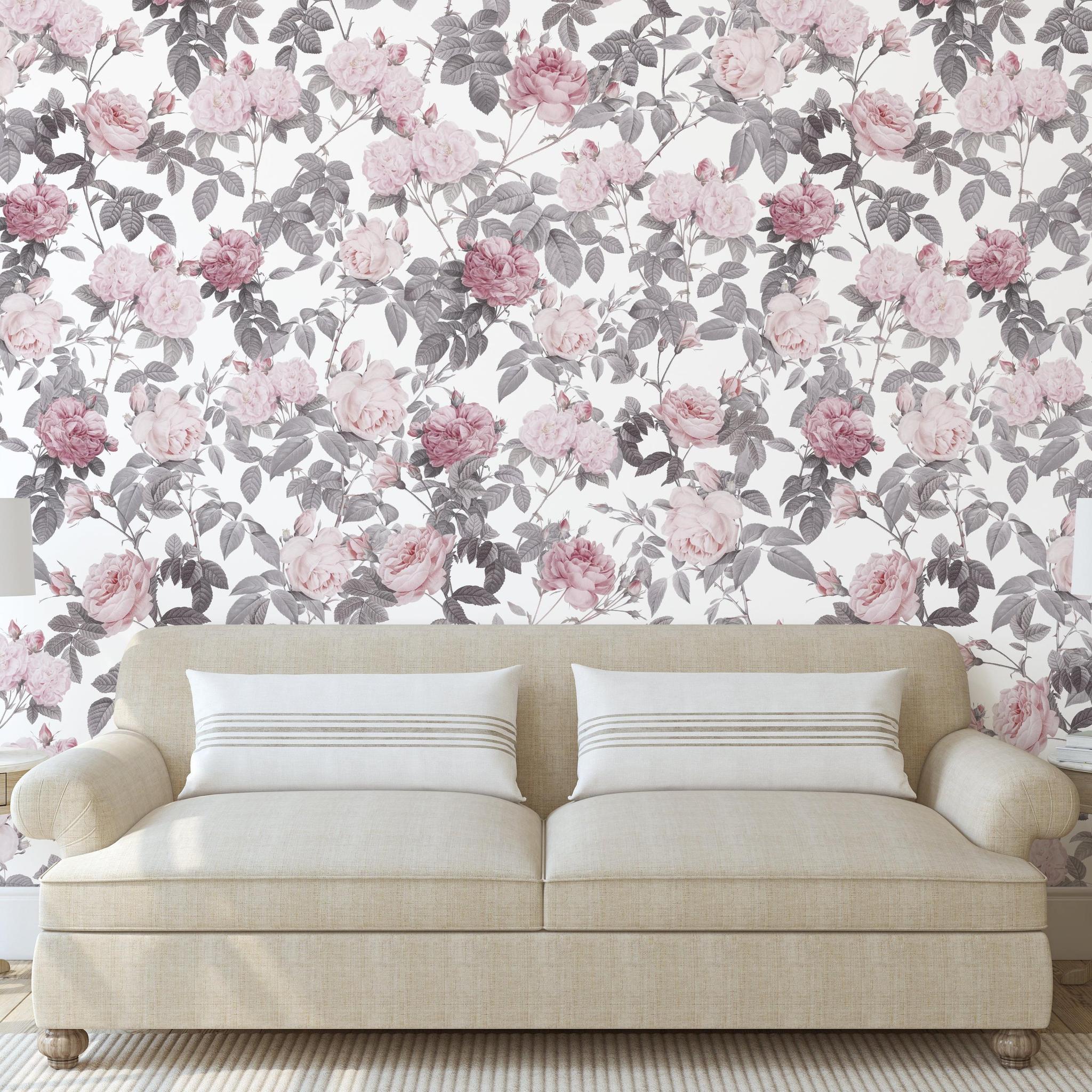 Beige sofa in a living room featuring Wall Blush SG02 Secret Garden (White) floral wallpaper focus.