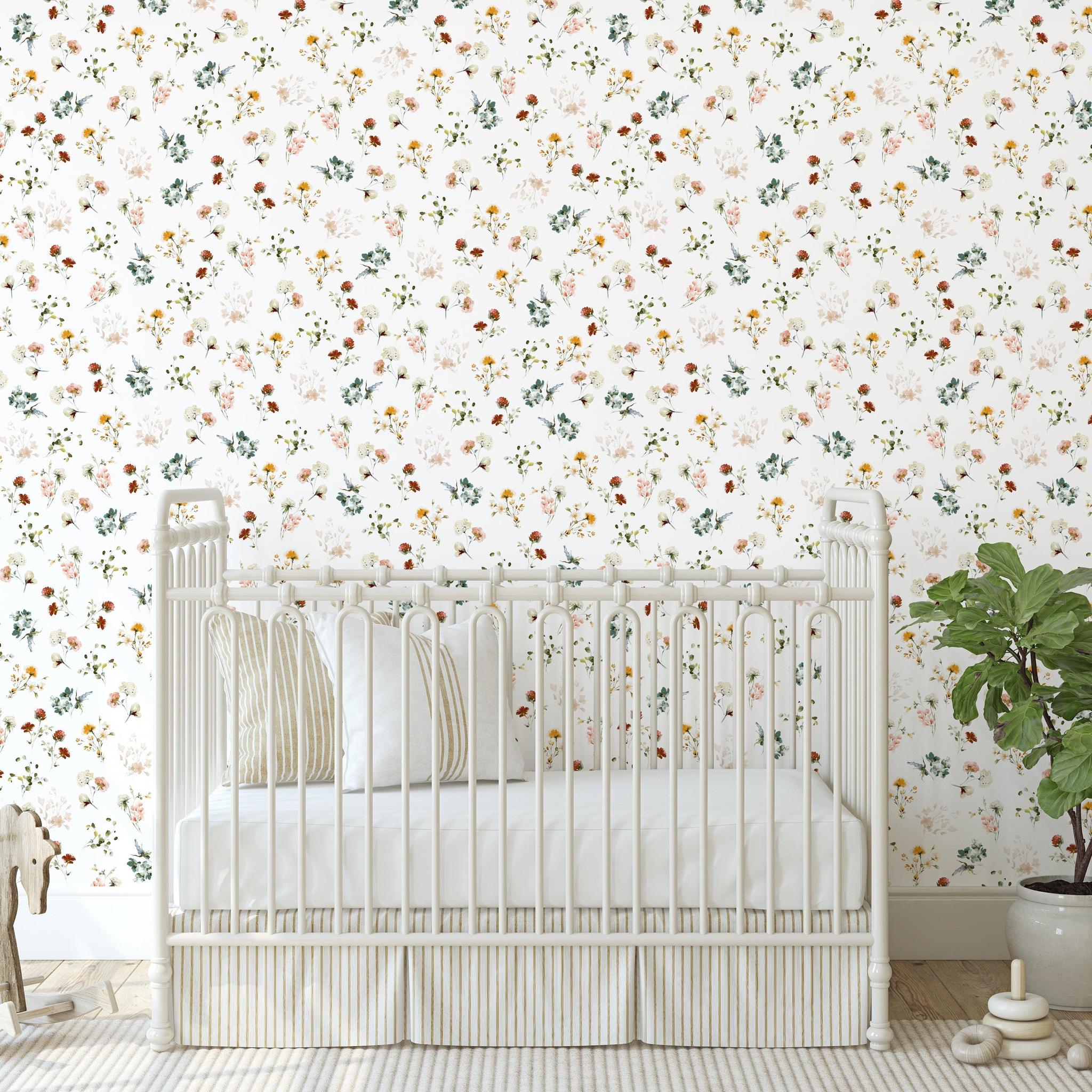 Wall Blush SG02 Wildflower Wallpaper in a serene nursery, showcasing the elegant floral design on the wall.