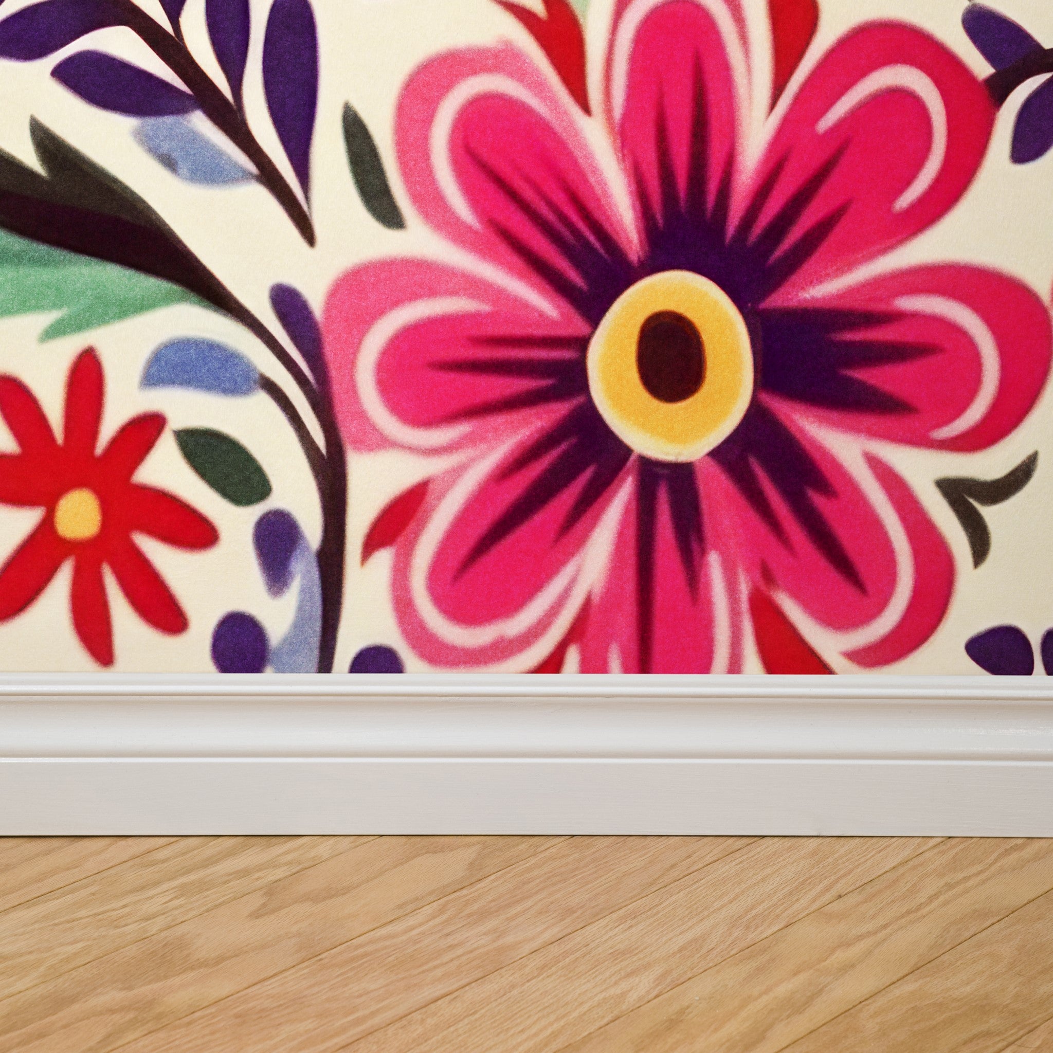 "Wall Blush Azalea Wallpaper adding vibrant floral elegance to a living room wall with focus on detail."