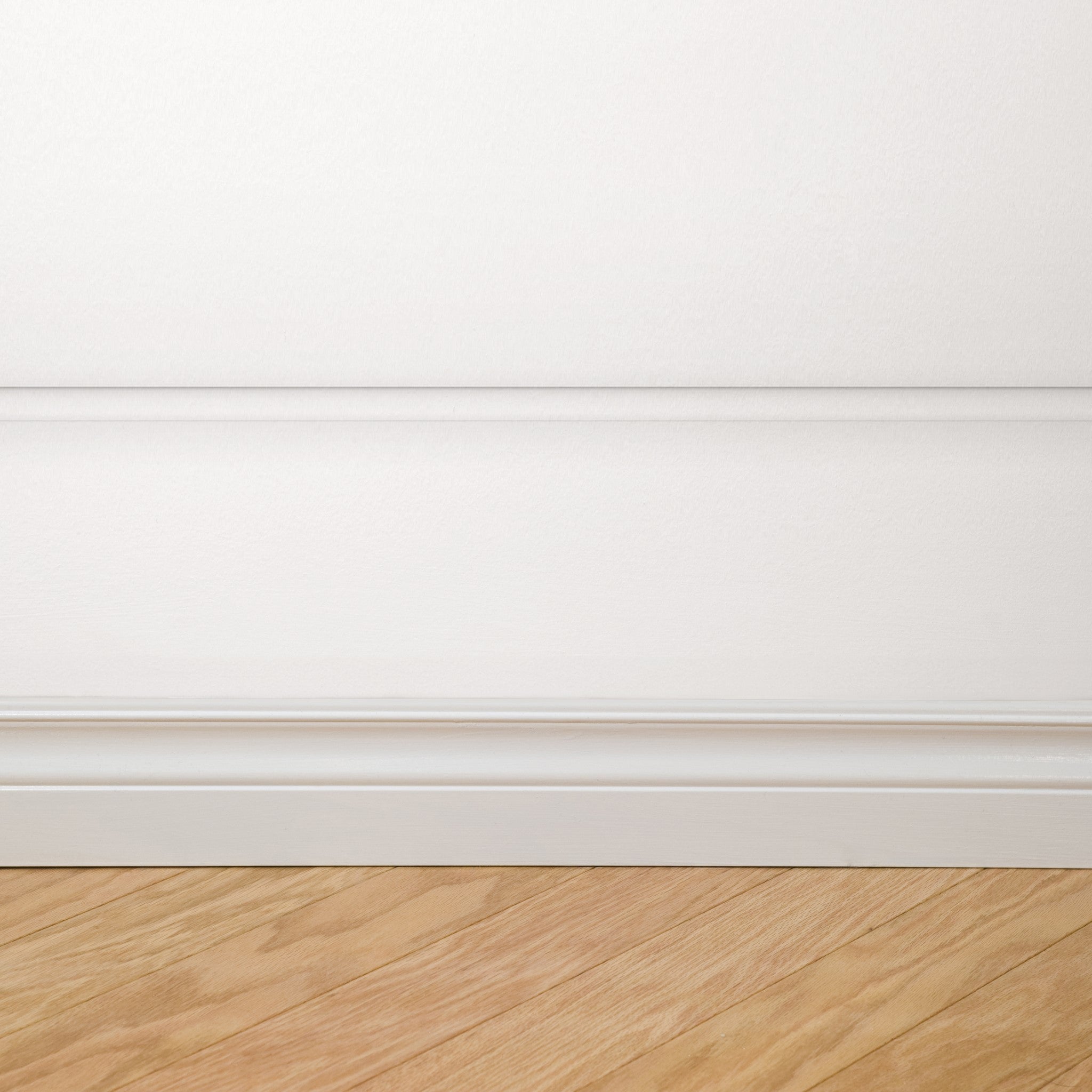 "White Anniston Wallpaper by Wall Blush highlighting elegant simplicity in a bedroom interior."
