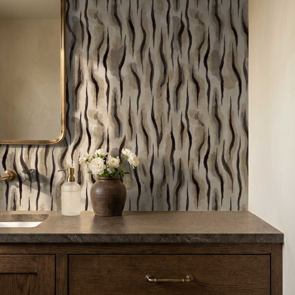 Abstract wavy wallpaper with earthy taupes and charcoal in modern bathroom setting.