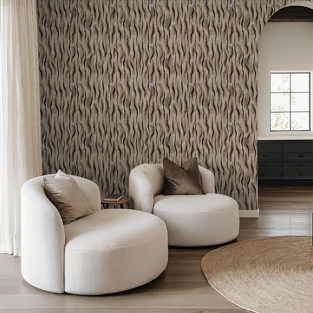 Abstract wavy wallpaper in taupe and beige in modern living room with white chairs.