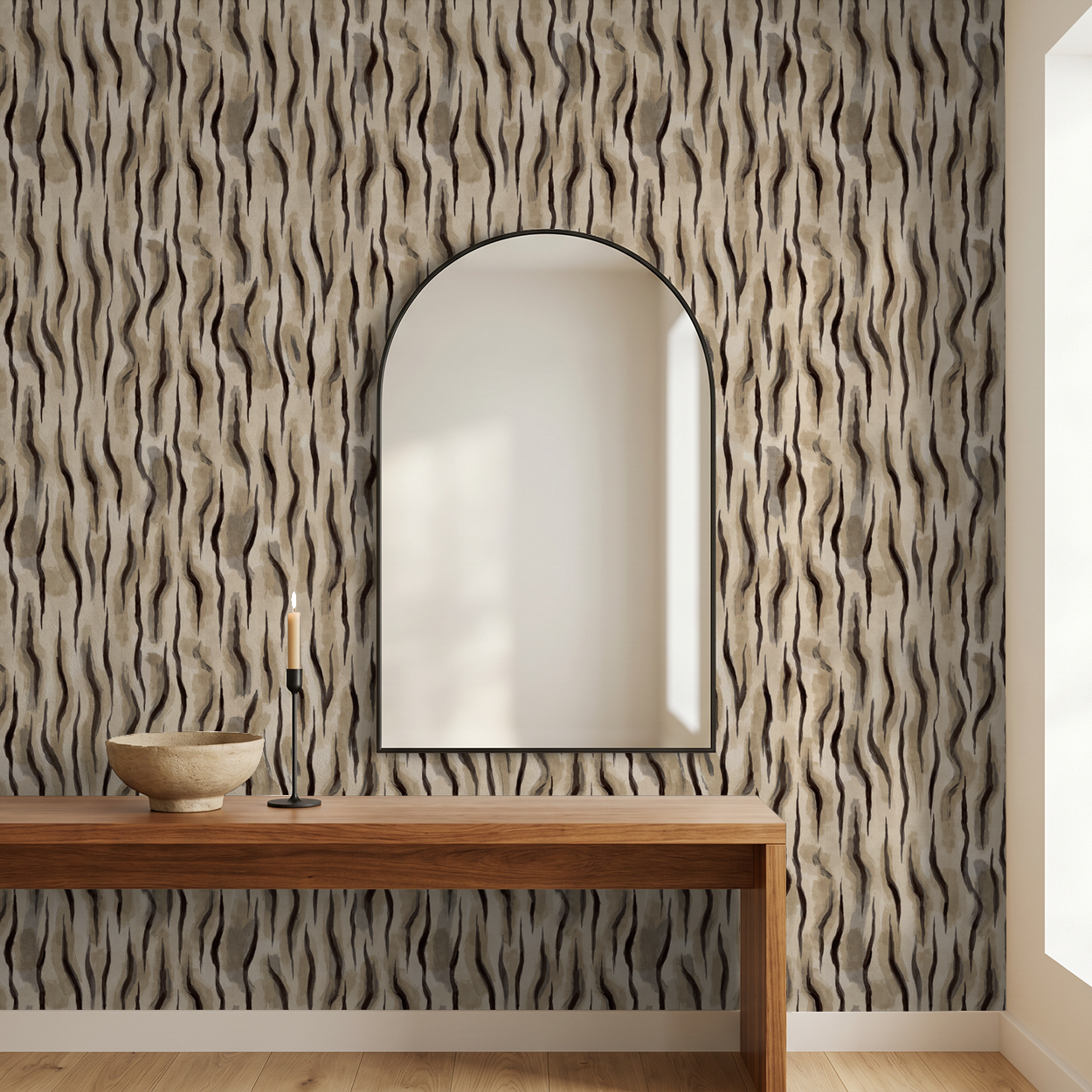 Abstract wavy wallpaper in taupe and charcoal in modern room with mirror and wooden table.