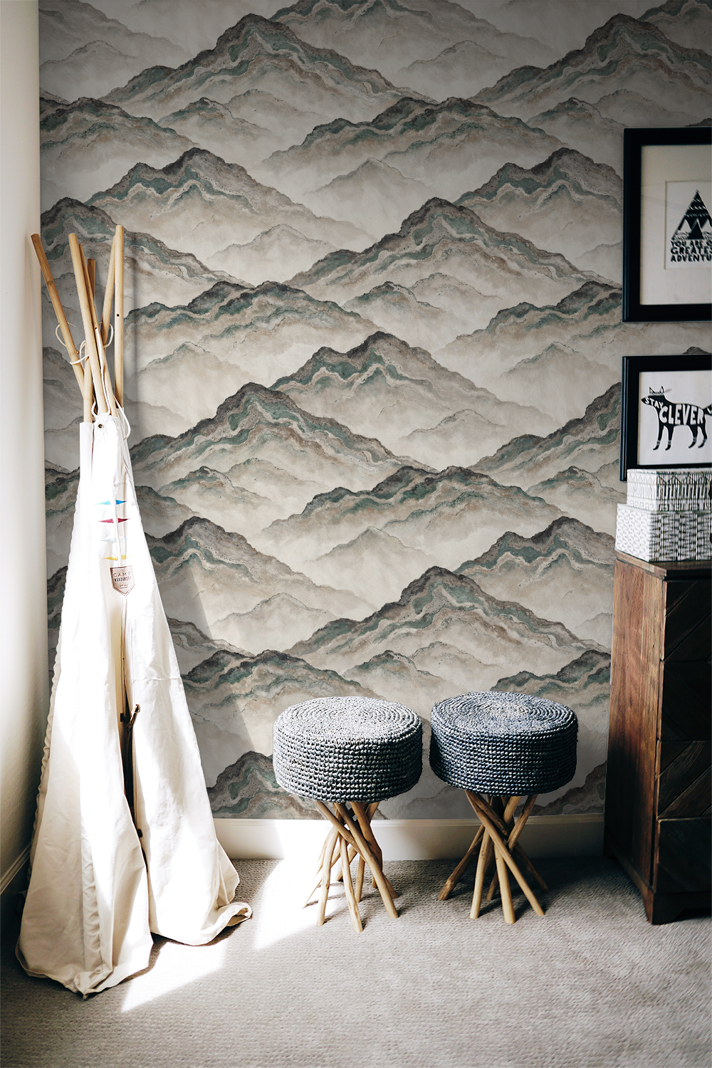 Mountain pattern wallpaper in earthy tones with rustic decor in a cozy room.