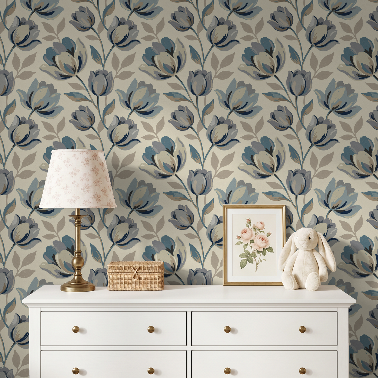 Elegant blue floral wallpaper in a cozy room with a white dresser and decor.