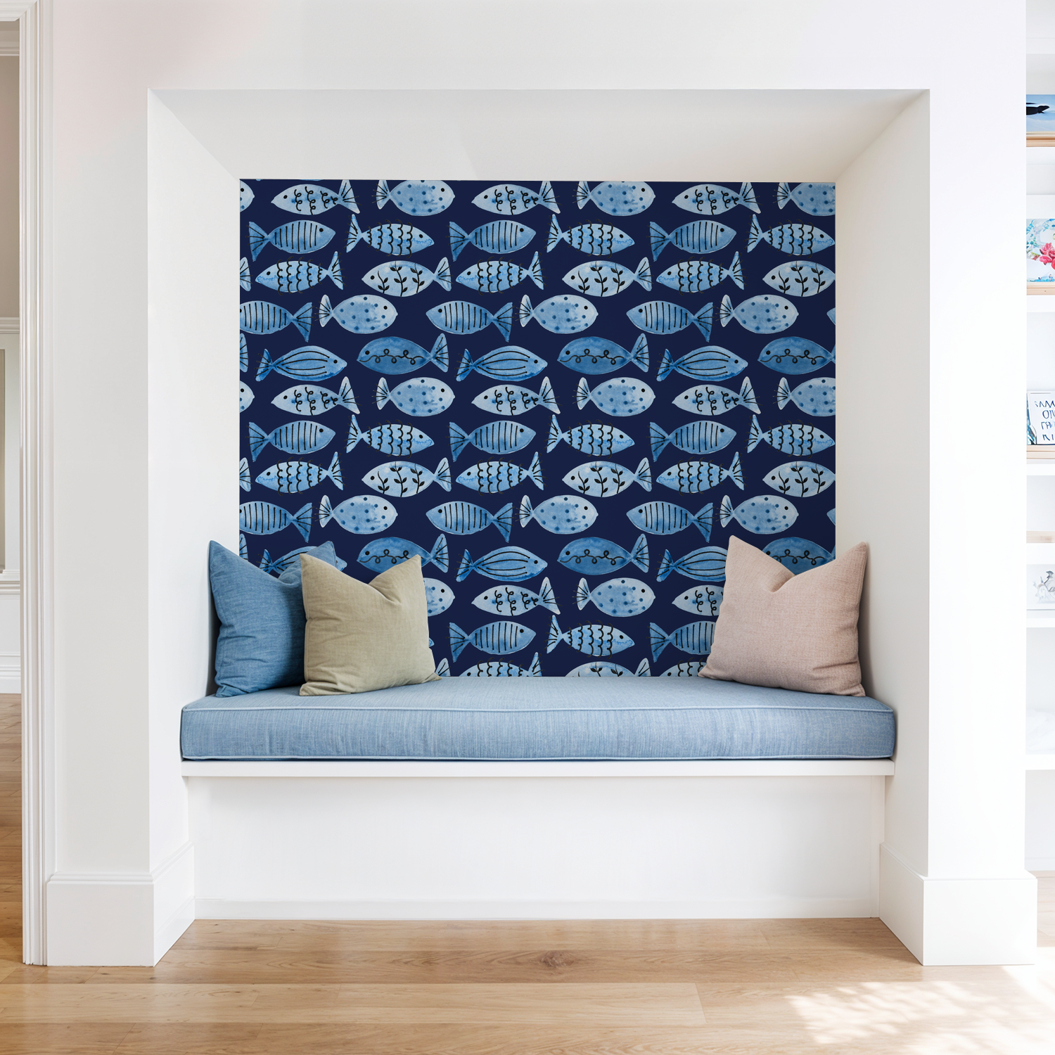 Blue fish patterned wallpaper in cozy nook with cushions