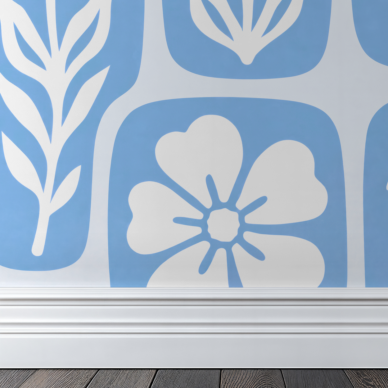 Blue floral wallpaper with white blossom silhouettes in modern room setting.