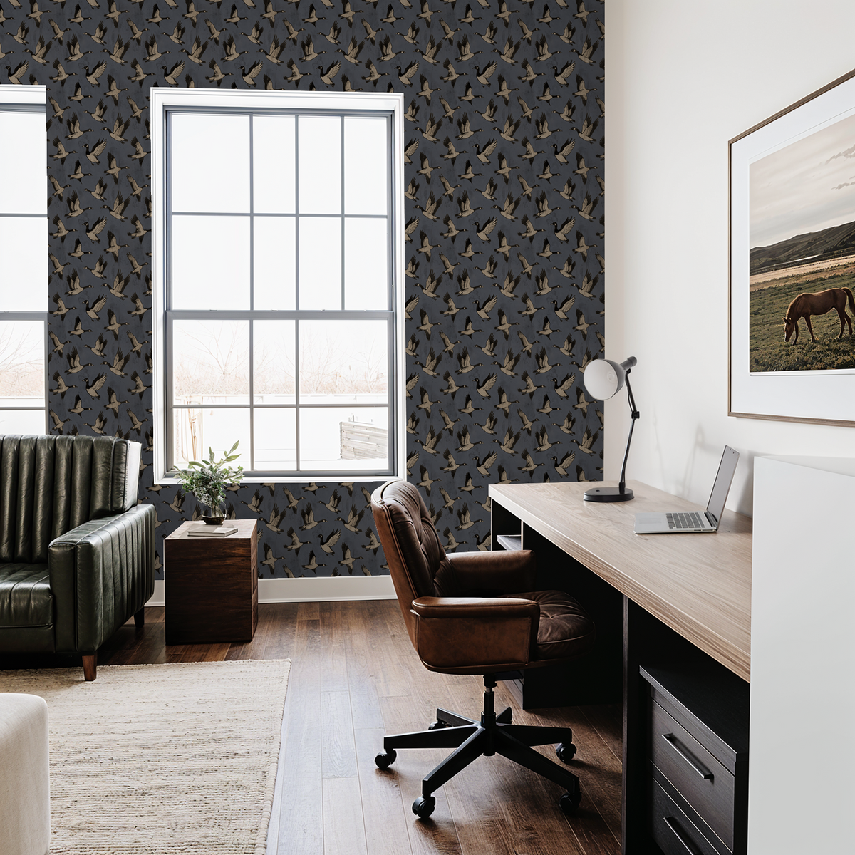 Blue wallpaper with flying geese pattern in modern home office setting.