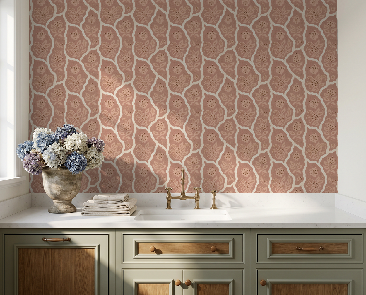 Blush floral wallpaper with cream accents in elegant kitchen setting.