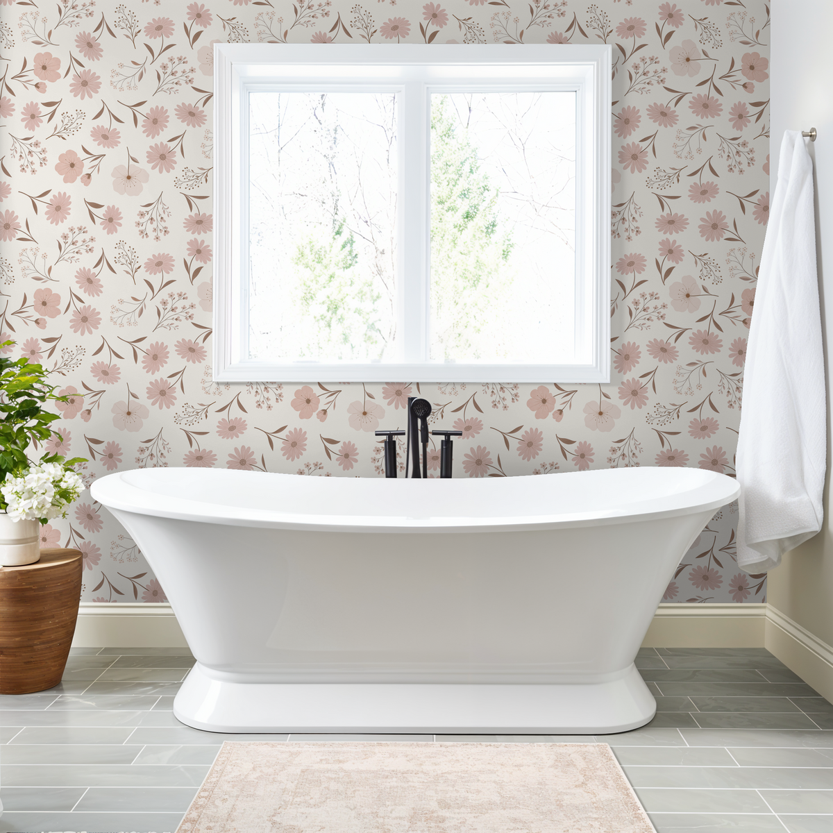 Elegant bathroom with blush floral wallpaper and freestanding tub