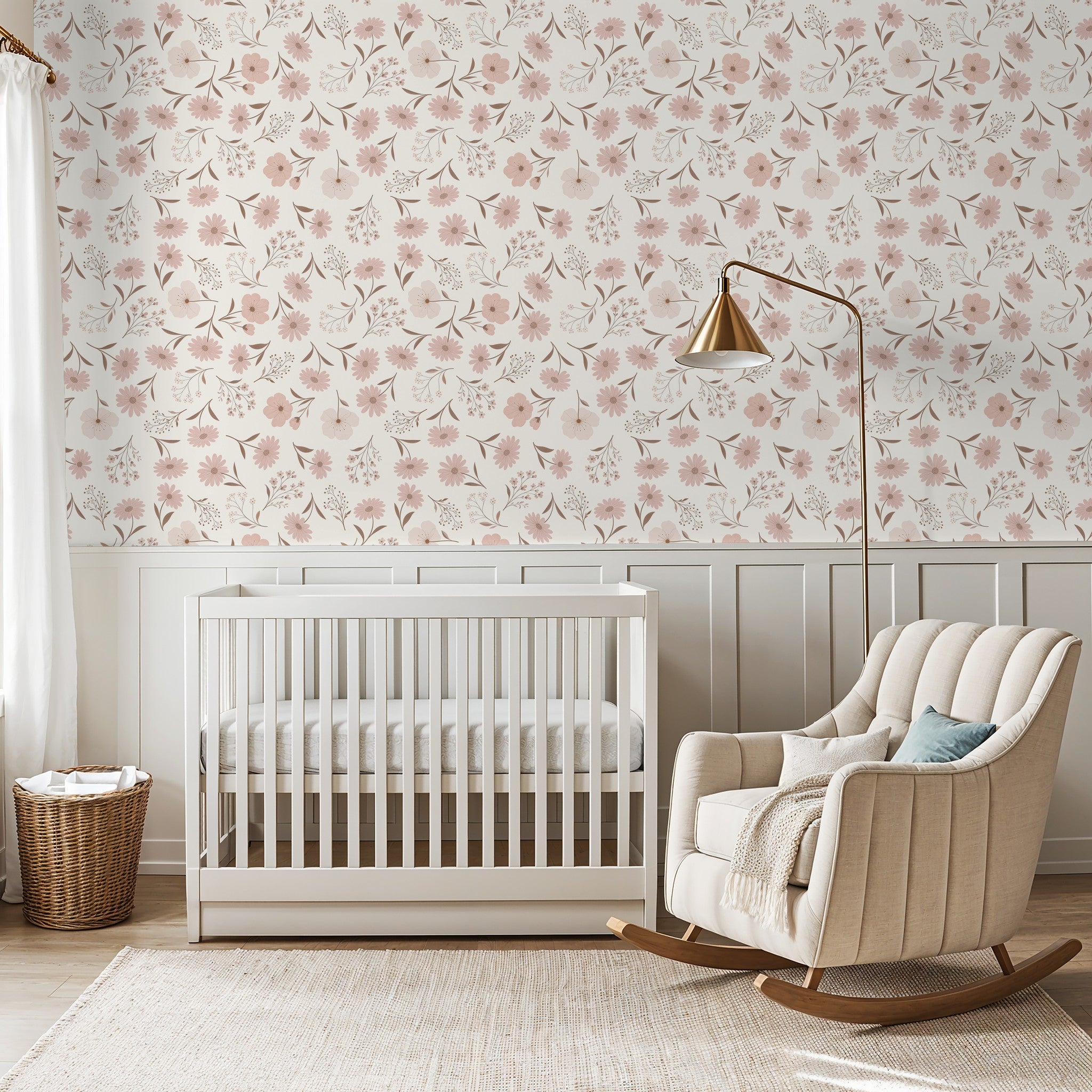 Blush floral wallpaper in nursery with crib and rocking chair