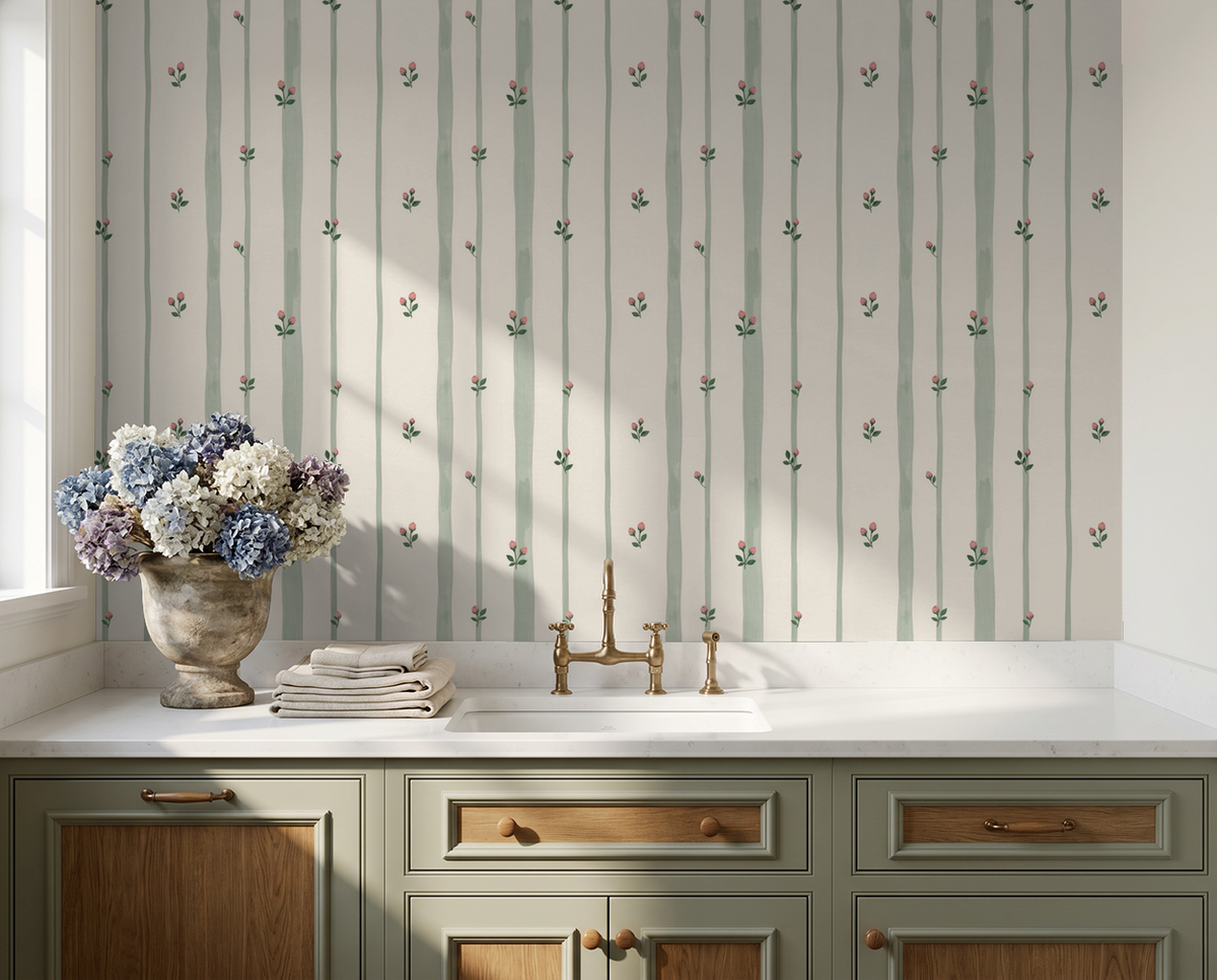 Bordeaux Bloom wallpaper with sage green stripes and pink buds in a vintage kitchen setting.