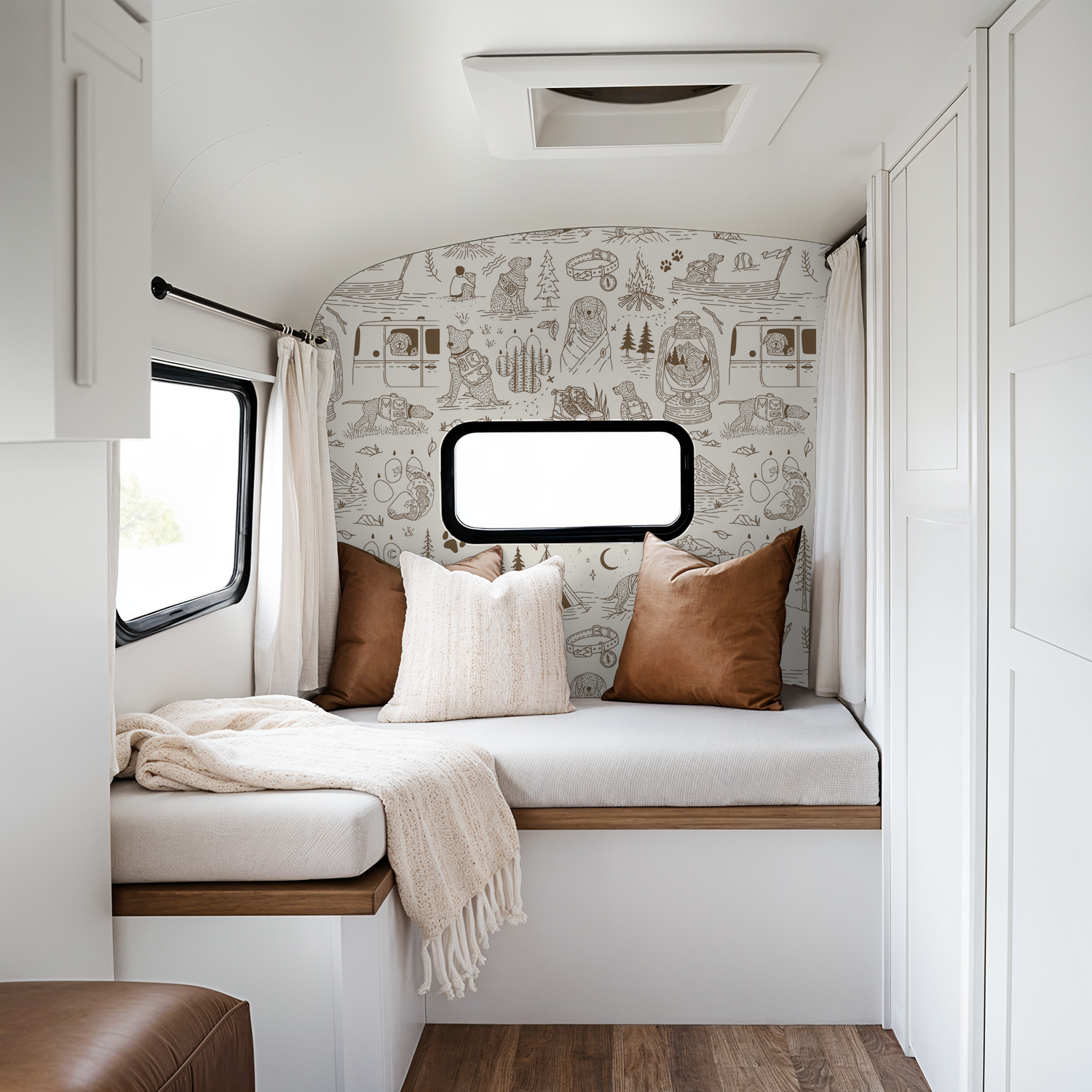 Brown and cream camping dog wallpaper in cozy camper setting.