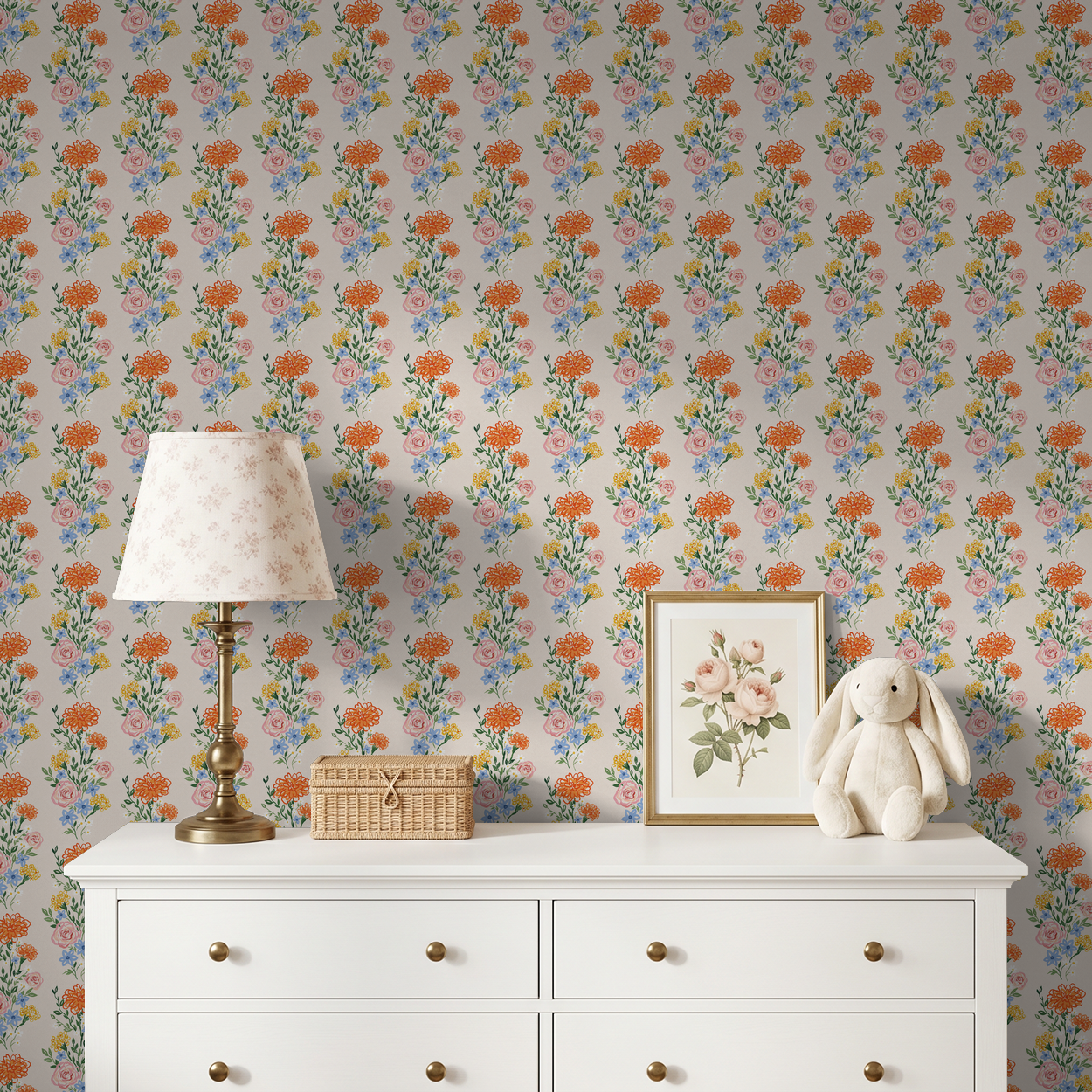 Eden Fields floral wallpaper with orange, pink, and blue flowers in a cozy room setting.