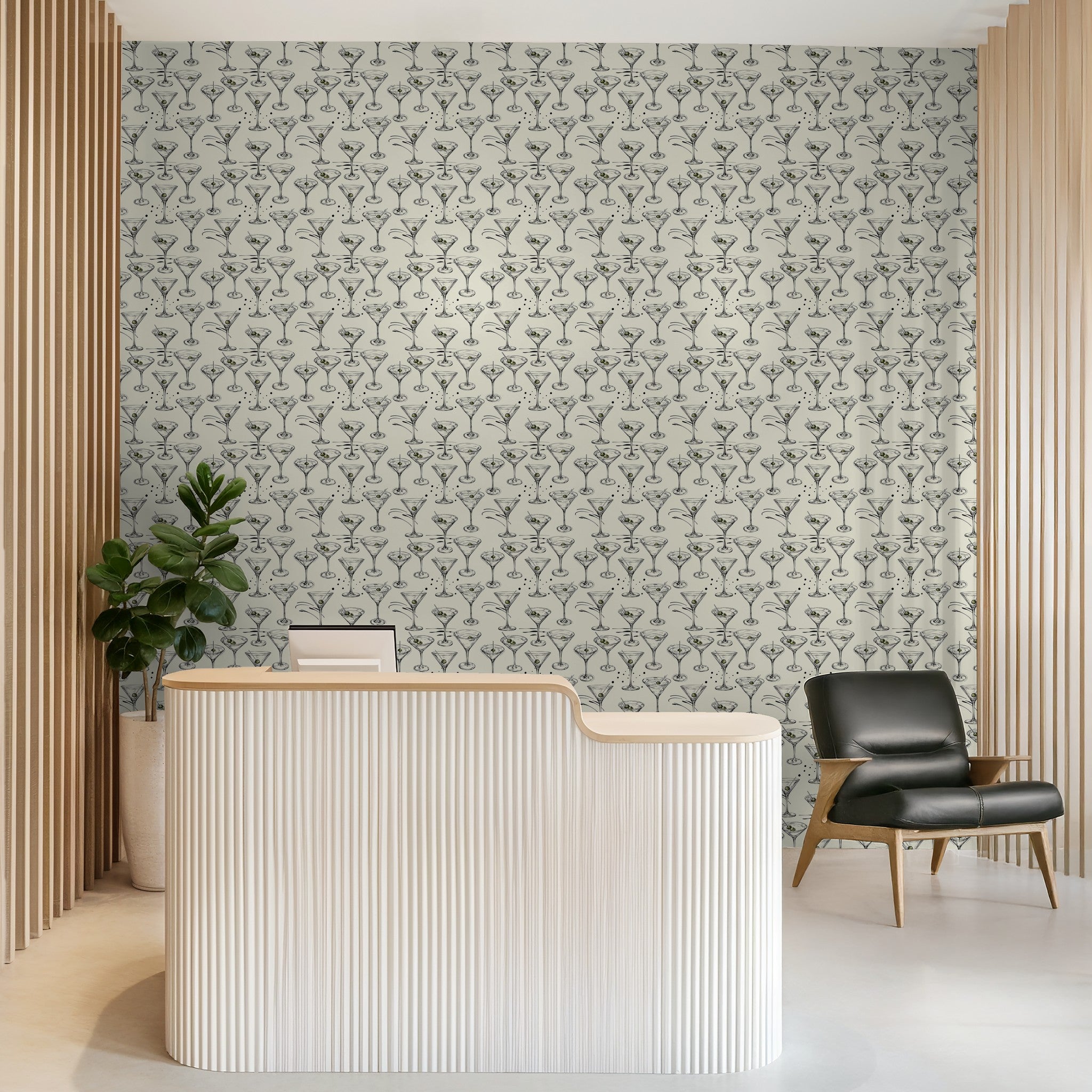 Elegant martini glass wallpaper with olives on cream background in modern lounge.
