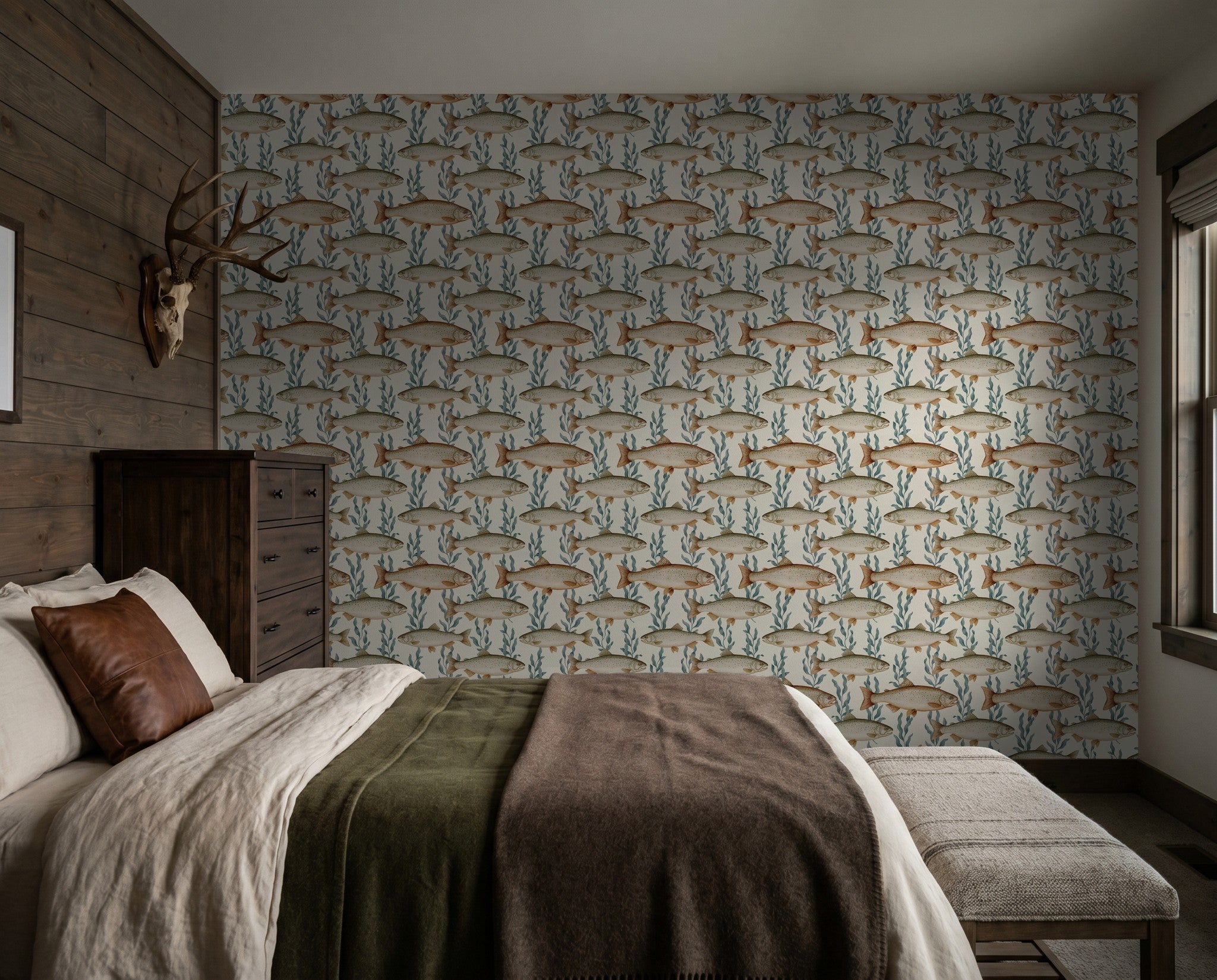Rustic bedroom with fish and seaweed wallpaper, wooden accents, and cozy bedding.