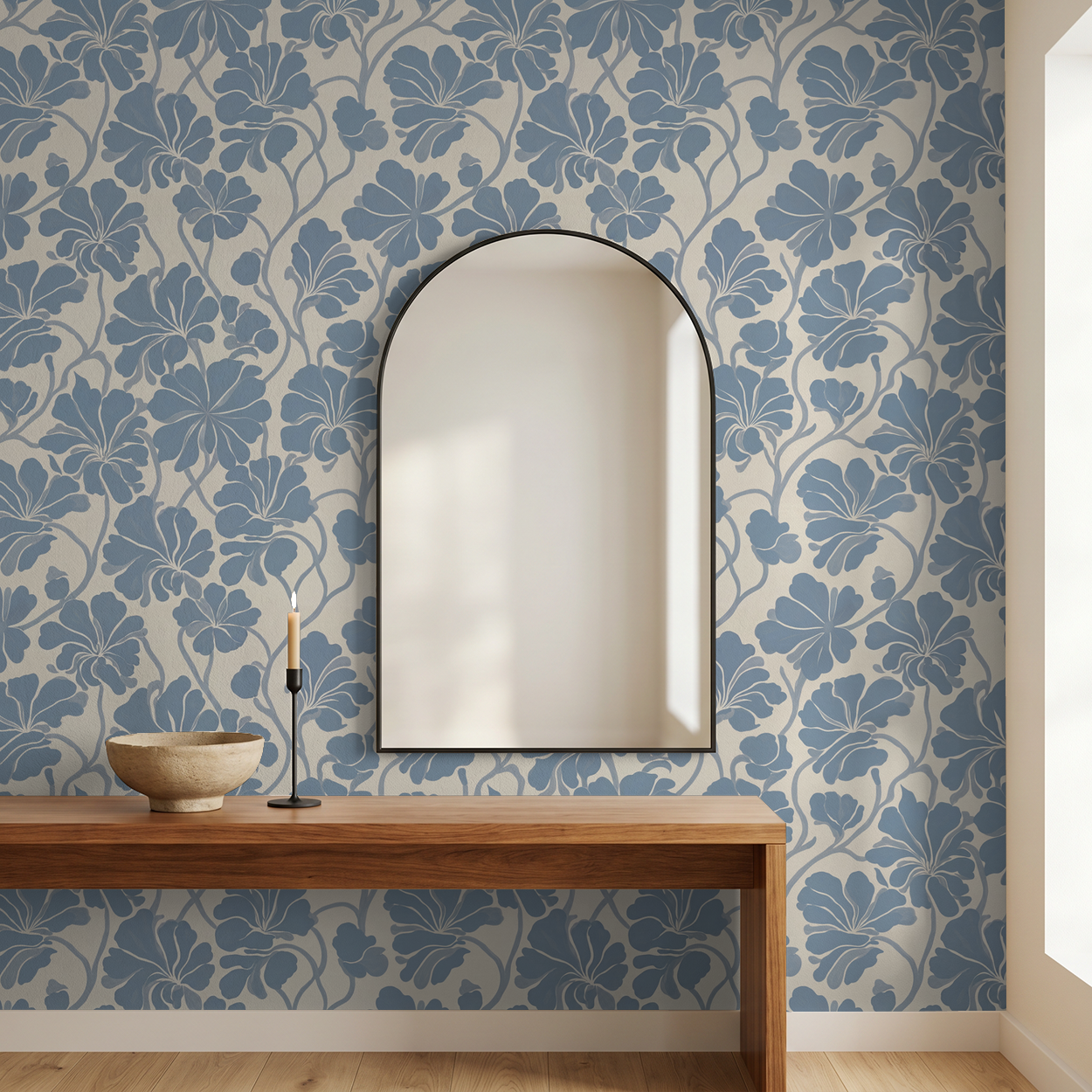 Soft blue floral wallpaper with vines in modern room with mirror and table.