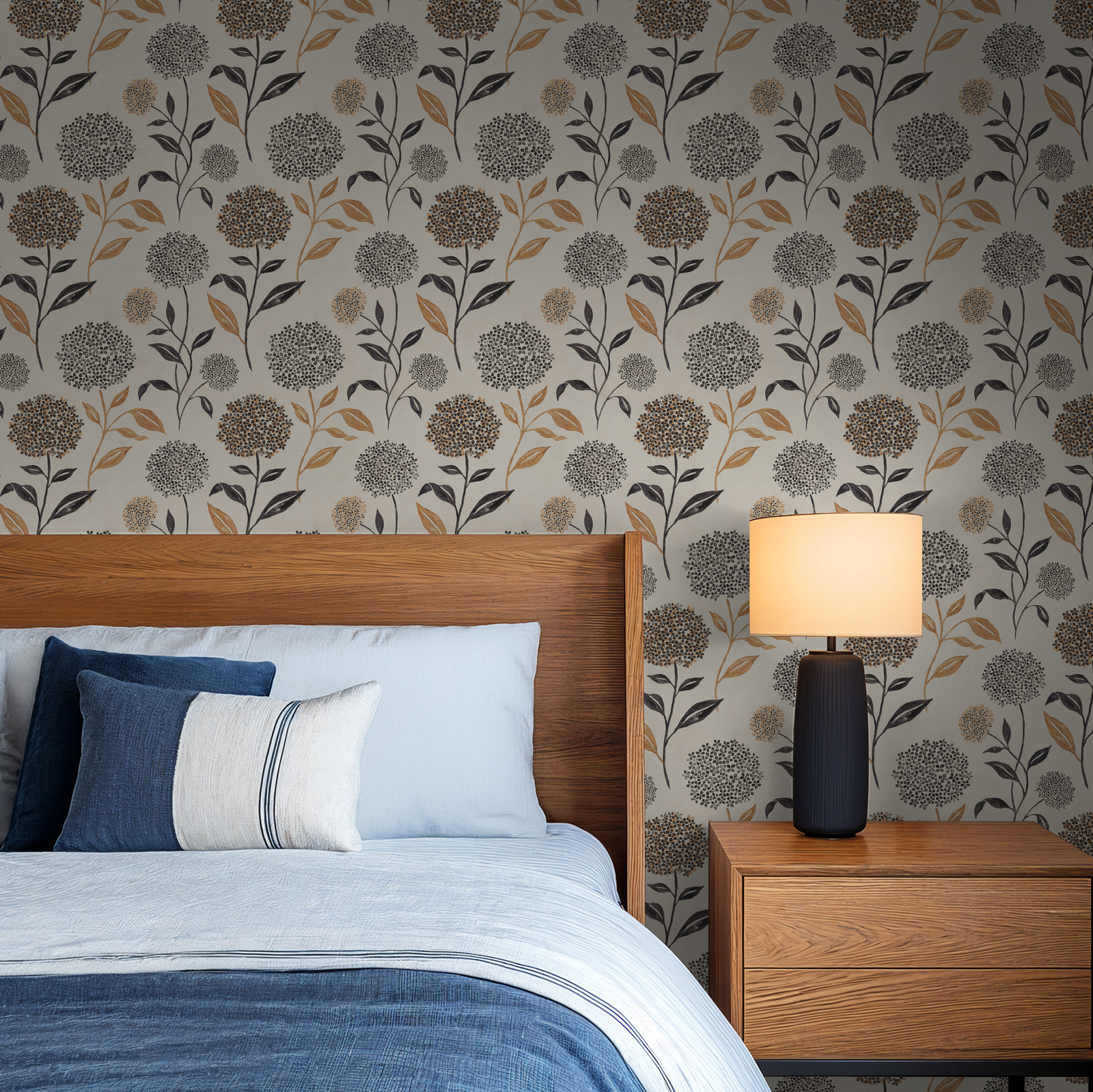 Floral wallpaper with terracotta and charcoal blooms in modern bedroom setting.