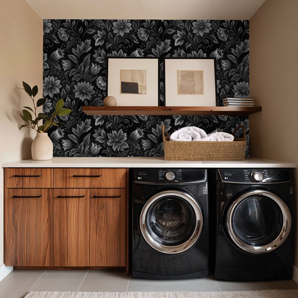 Gray floral wallpaper in a modern laundry room with wooden cabinets and washer dryer.