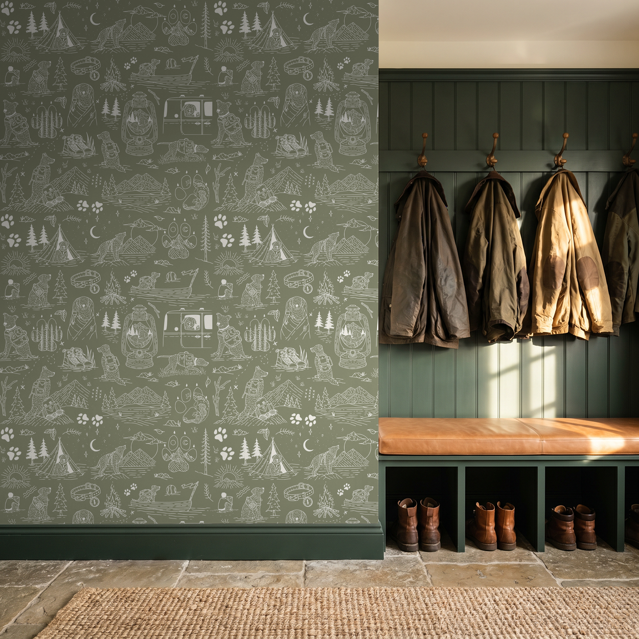 Green wallpaper with playful dog sketches, tents, mountains in rustic entryway.