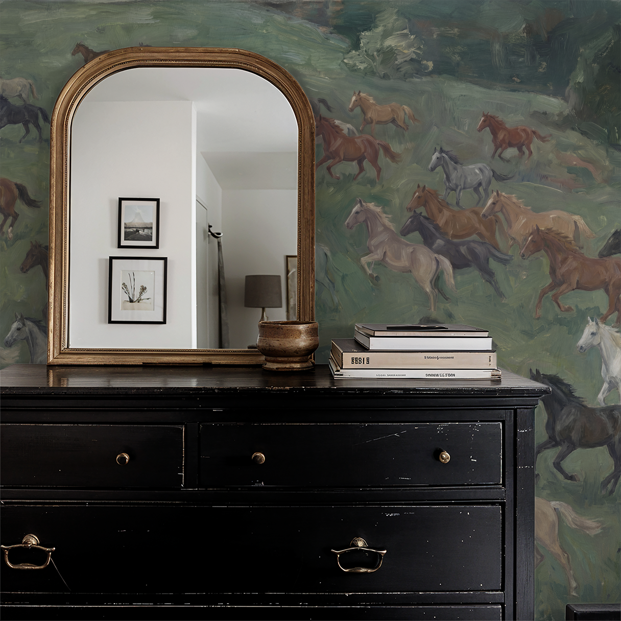 Horses galloping on green meadow wallpaper in rustic room with mirror and dresser.