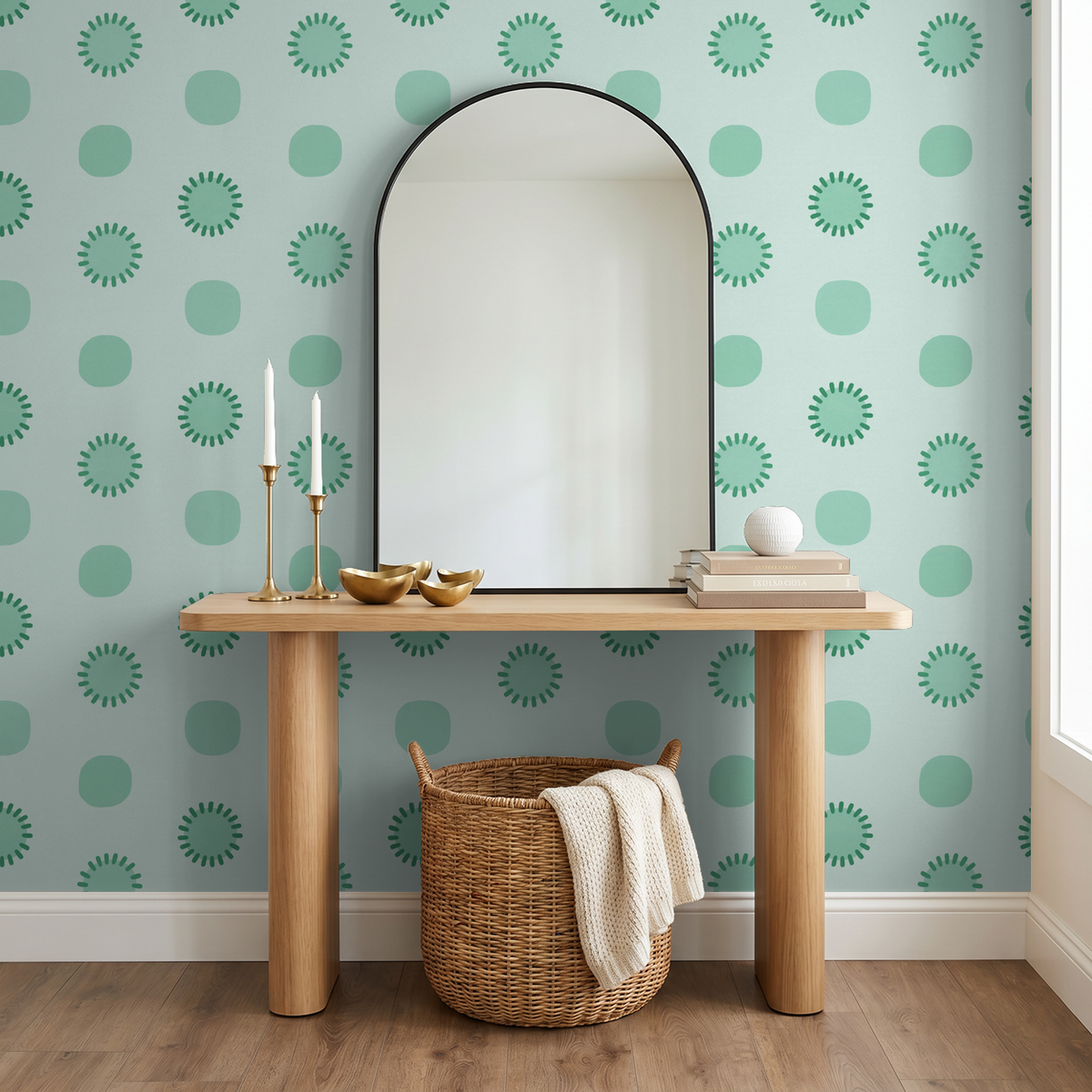 Mint green circular pattern wallpaper in modern room with mirror and wooden table.